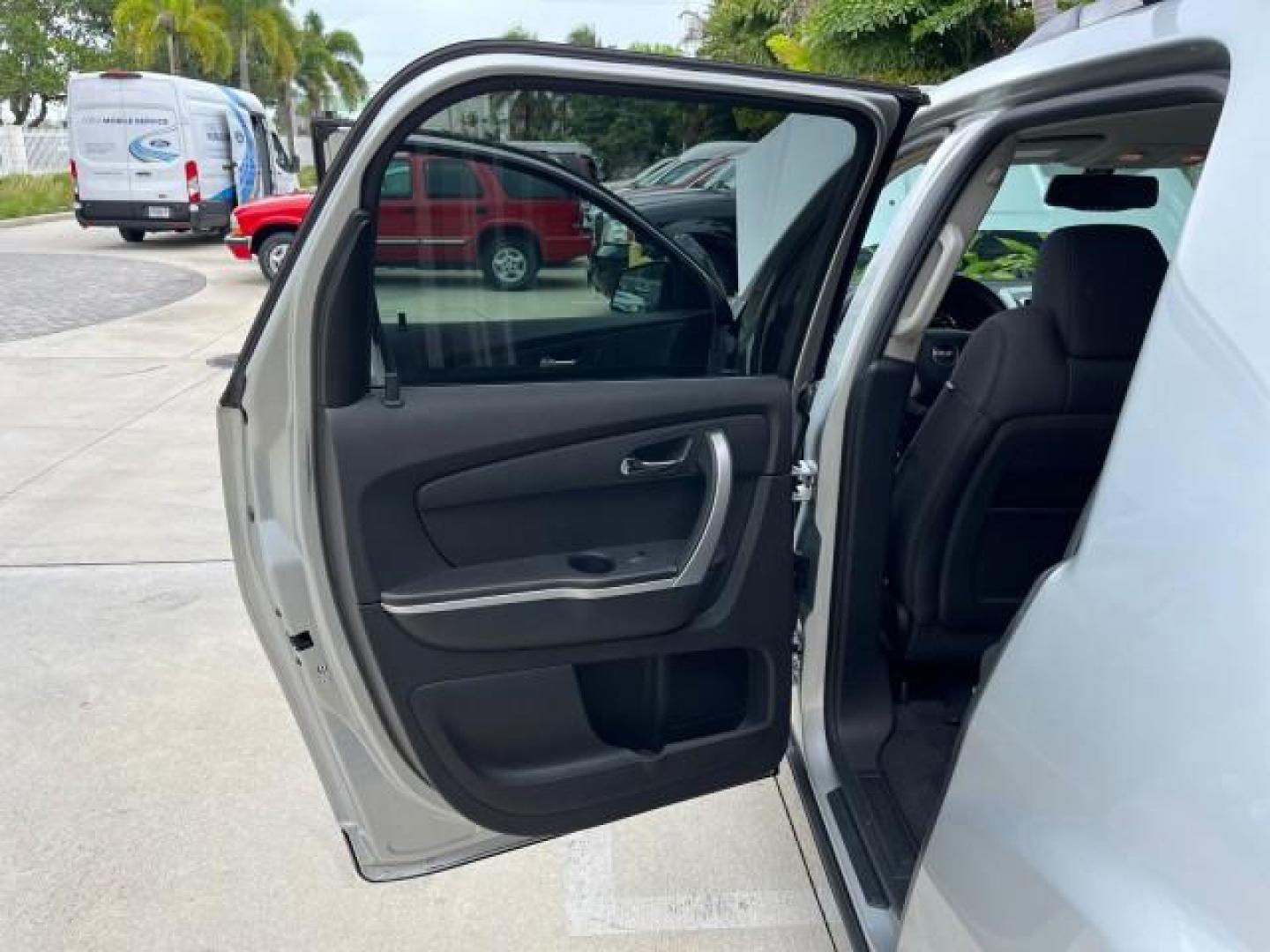 2010 Quicksilver Metallic /Ebony GMC Acadia 1 FL SLE LOW MILES 63,386 (1GKLRLED5AJ) with an 3.6L SIDI V6 Engine engine, Automatic transmission, located at 4701 North Dixie Hwy, Pompano Beach, FL, 33064, (954) 422-2889, 26.240938, -80.123474 - OUR WEBPAGE FLORIDACARS1.COM HAS OVER 100 PHOTOS AND FREE CARFAX LINK 2010 GMC ACADIA SLE ROAD READY 3.6L V6 VIN: 1GKLRLED5AJ190457 NO RECALLS 4 DOOR WAGON/SPORT UTILITY 1 OWNER FLORIDA 3.6L V6 F DOHC 24V 3 ROW SEATS GASOLINE POWER SEATS/MIRRORS LOW MILES 63,386 FRONT WHEEL DRIVE BACK UP CAMERA PARK - Photo#14