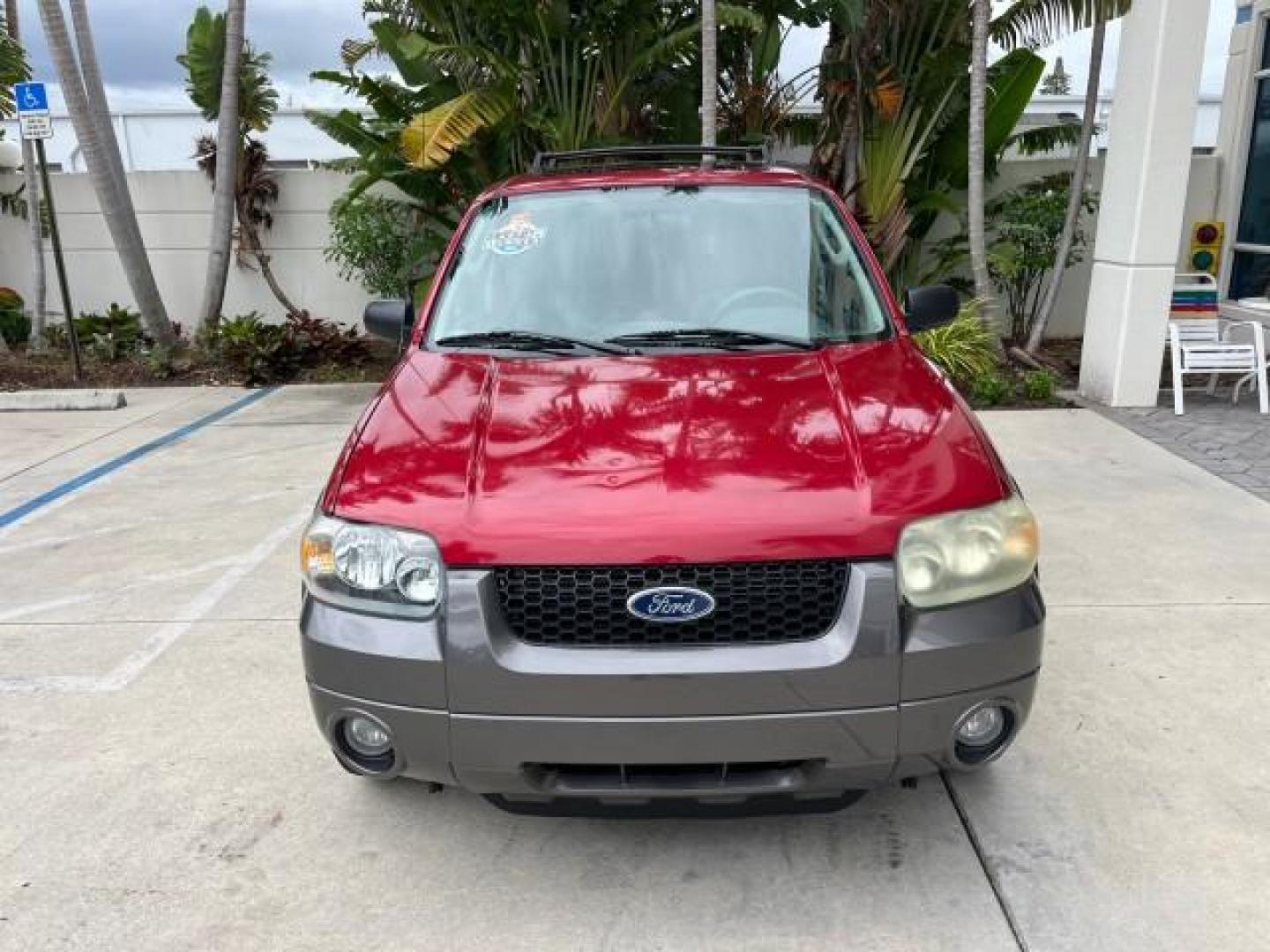 2006 Redfire Metallic /Medium/Dk Flint Ford Escape 1 FL 4wd XLT LOW MILES 35,769 (1FMYU93106K) with an 3.0L DOHC SEFI 24-Valve V6 Duratec Engine engine, Automatic transmission, located at 4701 North Dixie Hwy, Pompano Beach, FL, 33064, (954) 422-2889, 26.240938, -80.123474 - OUR WEBPAGE FLORIDACARS1.COM HAS OVER 100 PHOTOS AND FREE CARFAX LINK 2006 FORD ESCAPE XLT ROAD READY 3.0L V6 VIN: 1FMYU93106KC44045 NO RECALLS 4X4 4 DOOR WAGON/SPORT UTILITY 1 OWNER FLORIDA 3.0L V6 F DOHC ON DEMAND 4WD GASOLINE LOW MILES 35,769 FRONT WHEEL DRIVE W/ 4X4 POWER SEATS/SUNROOF AWD Anti- - Photo#2