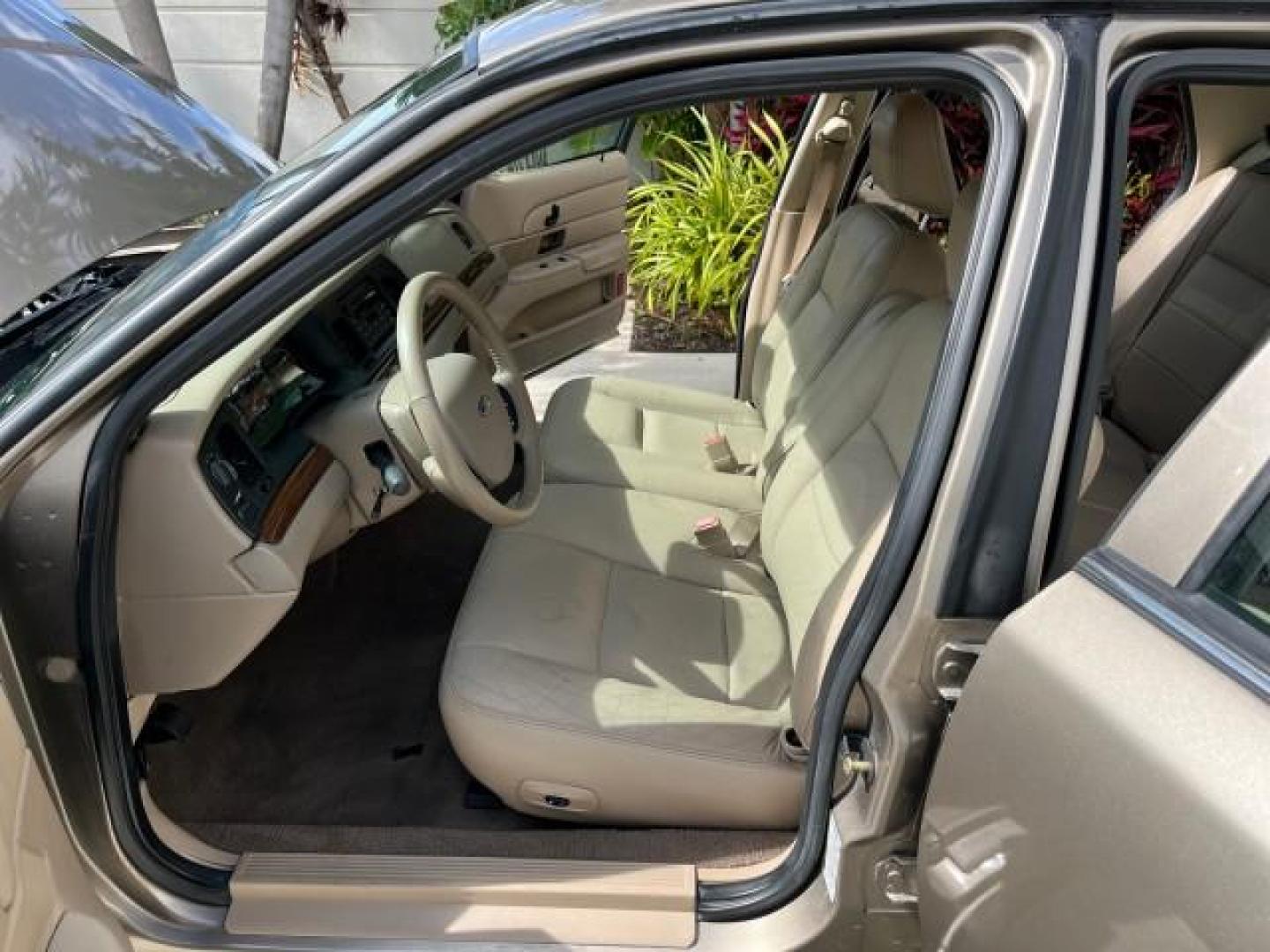 2005 Arizona Beige Metallic /Light Flint Ford Crown Victoria LX LOW MILES 47,163 (2FAFP74W95X) with an 4.6L SEFI OHC V8 Engine engine, Automatic transmission, located at 4701 North Dixie Hwy, Pompano Beach, FL, 33064, (954) 422-2889, 26.240938, -80.123474 - 2005 FORD CROWN VICTORIA LX ROAD READY 4.6L V8 VIN: 2FAFP74W95X107334 NO ACCIDENTS SEDAN 4 DR NO RECALLS 4.6L V8 F LOW MILES 47,163 GASOLINE POWER LEATHER SEATS REAR WHEEL DRIVE 6 SERVICE RECORDS Alloy Wheels Anti-Theft System Automatic Climate Control Cruise Control Power Seats RWD Rear Privacy Gla - Photo#10