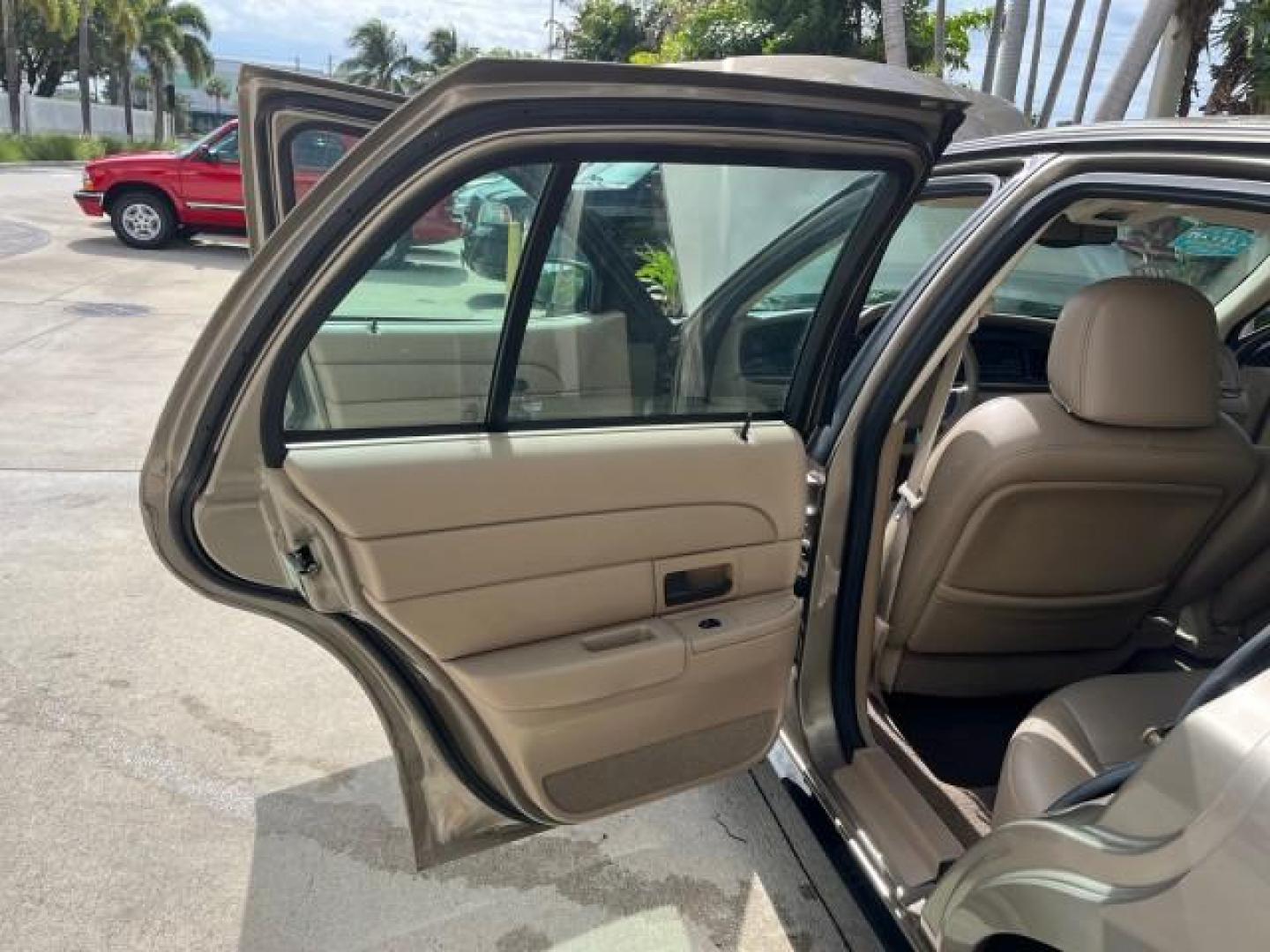 2005 Arizona Beige Metallic /Light Flint Ford Crown Victoria LX LOW MILES 47,163 (2FAFP74W95X) with an 4.6L SEFI OHC V8 Engine engine, Automatic transmission, located at 4701 North Dixie Hwy, Pompano Beach, FL, 33064, (954) 422-2889, 26.240938, -80.123474 - 2005 FORD CROWN VICTORIA LX ROAD READY 4.6L V8 VIN: 2FAFP74W95X107334 NO ACCIDENTS SEDAN 4 DR NO RECALLS 4.6L V8 F LOW MILES 47,163 GASOLINE POWER LEATHER SEATS REAR WHEEL DRIVE 6 SERVICE RECORDS Alloy Wheels Anti-Theft System Automatic Climate Control Cruise Control Power Seats RWD Rear Privacy Gla - Photo#13