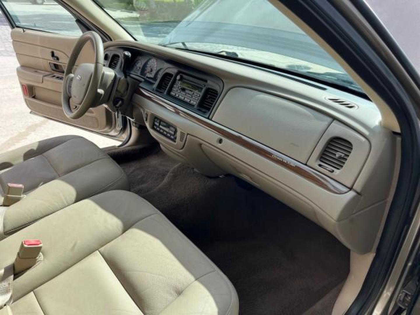 2005 Arizona Beige Metallic /Light Flint Ford Crown Victoria LX LOW MILES 47,163 (2FAFP74W95X) with an 4.6L SEFI OHC V8 Engine engine, Automatic transmission, located at 4701 North Dixie Hwy, Pompano Beach, FL, 33064, (954) 422-2889, 26.240938, -80.123474 - 2005 FORD CROWN VICTORIA LX ROAD READY 4.6L V8 VIN: 2FAFP74W95X107334 NO ACCIDENTS SEDAN 4 DR NO RECALLS 4.6L V8 F LOW MILES 47,163 GASOLINE POWER LEATHER SEATS REAR WHEEL DRIVE 6 SERVICE RECORDS Alloy Wheels Anti-Theft System Automatic Climate Control Cruise Control Power Seats RWD Rear Privacy Gla - Photo#26