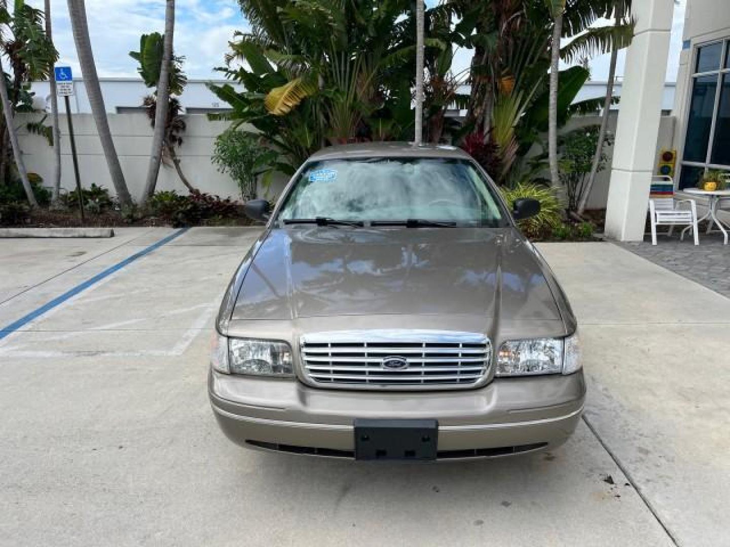 2005 Arizona Beige Metallic /Light Flint Ford Crown Victoria LX LOW MILES 47,163 (2FAFP74W95X) with an 4.6L SEFI OHC V8 Engine engine, Automatic transmission, located at 4701 North Dixie Hwy, Pompano Beach, FL, 33064, (954) 422-2889, 26.240938, -80.123474 - 2005 FORD CROWN VICTORIA LX ROAD READY 4.6L V8 VIN: 2FAFP74W95X107334 NO ACCIDENTS SEDAN 4 DR NO RECALLS 4.6L V8 F LOW MILES 47,163 GASOLINE POWER LEATHER SEATS REAR WHEEL DRIVE 6 SERVICE RECORDS Alloy Wheels Anti-Theft System Automatic Climate Control Cruise Control Power Seats RWD Rear Privacy Gla - Photo#2