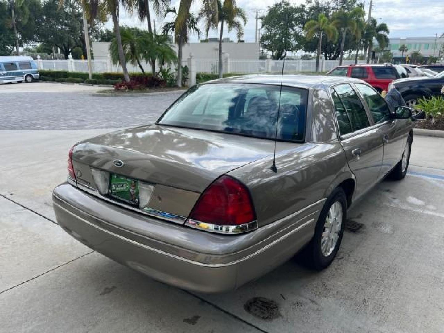 2005 Arizona Beige Metallic /Light Flint Ford Crown Victoria LX LOW MILES 47,163 (2FAFP74W95X) with an 4.6L SEFI OHC V8 Engine engine, Automatic transmission, located at 4701 North Dixie Hwy, Pompano Beach, FL, 33064, (954) 422-2889, 26.240938, -80.123474 - 2005 FORD CROWN VICTORIA LX ROAD READY 4.6L V8 VIN: 2FAFP74W95X107334 NO ACCIDENTS SEDAN 4 DR NO RECALLS 4.6L V8 F LOW MILES 47,163 GASOLINE POWER LEATHER SEATS REAR WHEEL DRIVE 6 SERVICE RECORDS Alloy Wheels Anti-Theft System Automatic Climate Control Cruise Control Power Seats RWD Rear Privacy Gla - Photo#89