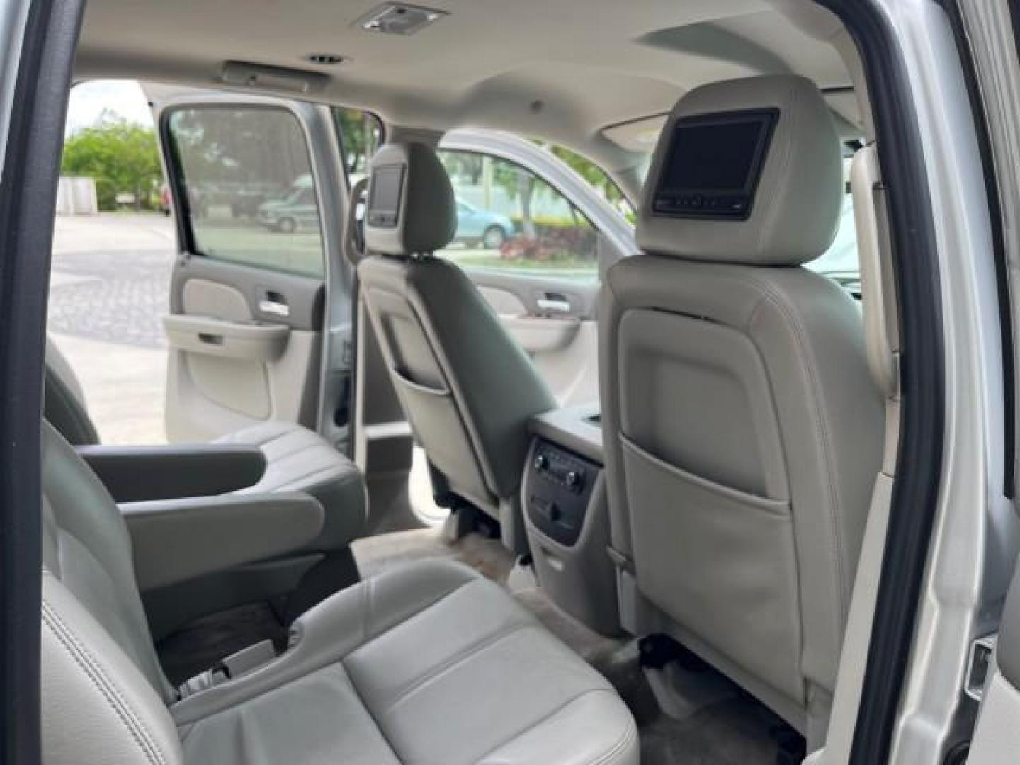 2011 Sheer Silver Metallic /Light Titanium/Dark Titanium Chevrolet Suburban 1 FL LT LOW MILES 71,788 (1GNSCJE00BR) with an 5.3L Vortec 1000 V8 SFI Flex-Fuel Engine engine, Automatic transmission, located at 4701 North Dixie Hwy, Pompano Beach, FL, 33064, (954) 422-2889, 26.240938, -80.123474 - OUR WEBPAGE FLORIDACARS1.COM HAS OVER 100 PHOTOS AND FREE CARFAX LINK 2011 CHEVROLET SUBURBAN LT ROAD READY 5.3L V8 VIN: 1GNSCJE00BR283133 NO RECALLS 4 DOOR WAGON/SPORT UTILITY LOW MILES 71,788 5.3L V8 F OHV 16V 19 SERVICE RECORDS FLEX FUEL PARK SENSORS 1 OWNER FLORIDA REAR WHEEL DRIVE NEW $48,455 3 - Photo#29