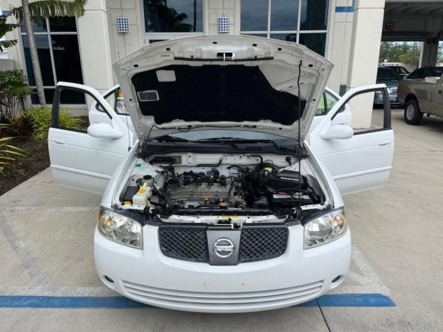 2006 Cloud White /Sage Nissan Sentra 1 FL 1.8 S LOW MILES 33,525 (3N1CB51D36L) with an 1.8L SMPI DOHC 16-Valve 4-Cyl Engine engine, Automatic transmission, located at 4701 North Dixie Hwy, Pompano Beach, FL, 33064, (954) 422-2889, 26.240938, -80.123474 - OUR WEBPAGE FLORIDACARS1.COM HAS OVER 100 PHOTOS AND FREE CARFAX LINK 2006 NISSAN SENTRA 1.8 ROAD READY 1.8L I4 VIN: 3N1CB51D36L640529 NO ACCIDENTS 34 MPG SEDAN 4 DR NO RECALLS 1.8L I4 F DOHC 16V 1 OWNER FLORIDA GASOLINE 14 SERVICE RECORDS FRONT WHEEL DRIVE LOW MILES 33,525 FWD Front Bucket Seats TH - Photo#16