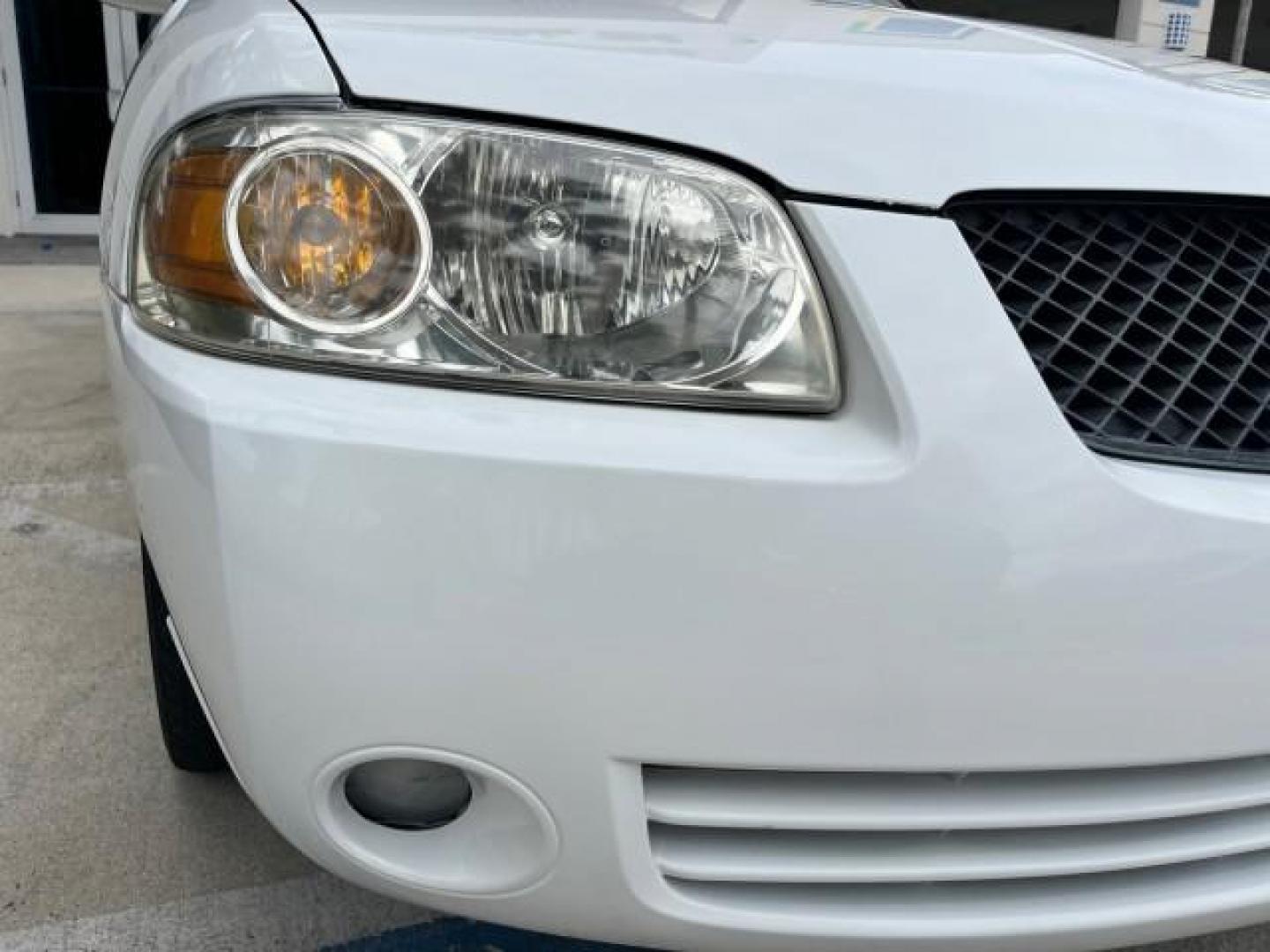 2006 Cloud White /Sage Nissan Sentra 1 FL 1.8 S LOW MILES 33,525 (3N1CB51D36L) with an 1.8L SMPI DOHC 16-Valve 4-Cyl Engine engine, Automatic transmission, located at 4701 North Dixie Hwy, Pompano Beach, FL, 33064, (954) 422-2889, 26.240938, -80.123474 - OUR WEBPAGE FLORIDACARS1.COM HAS OVER 100 PHOTOS AND FREE CARFAX LINK 2006 NISSAN SENTRA 1.8 ROAD READY 1.8L I4 VIN: 3N1CB51D36L640529 NO ACCIDENTS 34 MPG SEDAN 4 DR NO RECALLS 1.8L I4 F DOHC 16V 1 OWNER FLORIDA GASOLINE 14 SERVICE RECORDS FRONT WHEEL DRIVE LOW MILES 33,525 FWD Front Bucket Seats TH - Photo#71