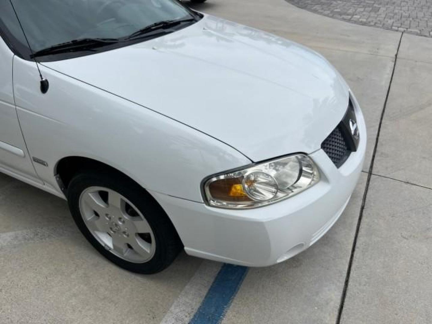 2006 Cloud White /Sage Nissan Sentra 1 FL 1.8 S LOW MILES 33,525 (3N1CB51D36L) with an 1.8L SMPI DOHC 16-Valve 4-Cyl Engine engine, Automatic transmission, located at 4701 North Dixie Hwy, Pompano Beach, FL, 33064, (954) 422-2889, 26.240938, -80.123474 - OUR WEBPAGE FLORIDACARS1.COM HAS OVER 100 PHOTOS AND FREE CARFAX LINK 2006 NISSAN SENTRA 1.8 ROAD READY 1.8L I4 VIN: 3N1CB51D36L640529 NO ACCIDENTS 34 MPG SEDAN 4 DR NO RECALLS 1.8L I4 F DOHC 16V 1 OWNER FLORIDA GASOLINE 14 SERVICE RECORDS FRONT WHEEL DRIVE LOW MILES 33,525 FWD Front Bucket Seats TH - Photo#74