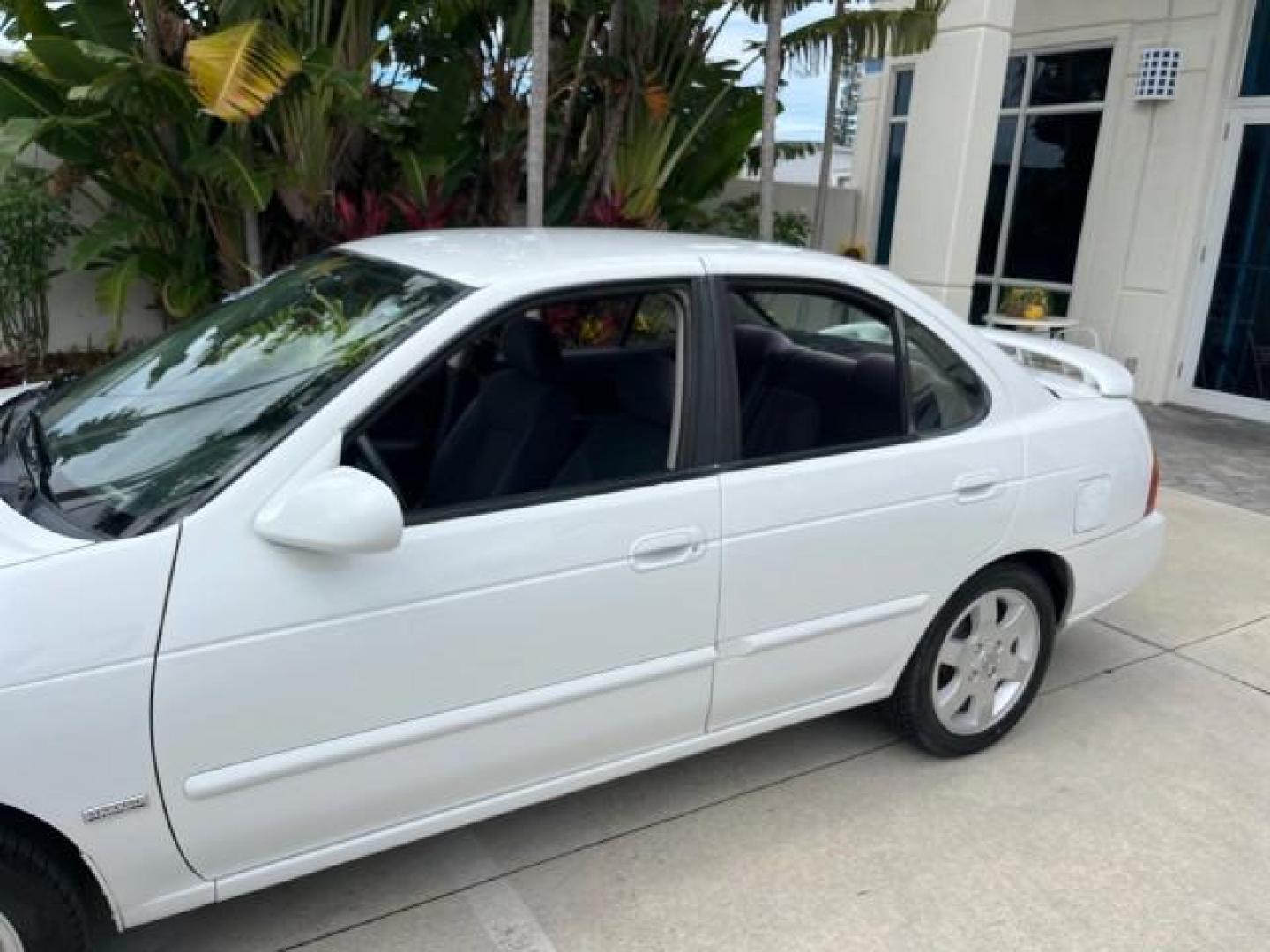 2006 Cloud White /Sage Nissan Sentra 1 FL 1.8 S LOW MILES 33,525 (3N1CB51D36L) with an 1.8L SMPI DOHC 16-Valve 4-Cyl Engine engine, Automatic transmission, located at 4701 North Dixie Hwy, Pompano Beach, FL, 33064, (954) 422-2889, 26.240938, -80.123474 - OUR WEBPAGE FLORIDACARS1.COM HAS OVER 100 PHOTOS AND FREE CARFAX LINK 2006 NISSAN SENTRA 1.8 ROAD READY 1.8L I4 VIN: 3N1CB51D36L640529 NO ACCIDENTS 34 MPG SEDAN 4 DR NO RECALLS 1.8L I4 F DOHC 16V 1 OWNER FLORIDA GASOLINE 14 SERVICE RECORDS FRONT WHEEL DRIVE LOW MILES 33,525 FWD Front Bucket Seats TH - Photo#77