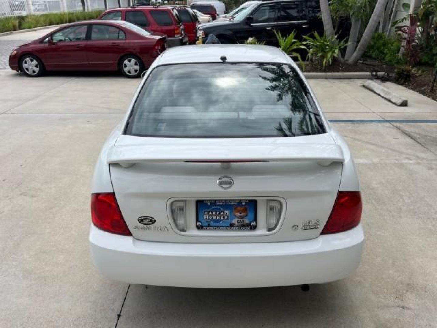 2006 Cloud White /Sage Nissan Sentra 1 FL 1.8 S LOW MILES 33,525 (3N1CB51D36L) with an 1.8L SMPI DOHC 16-Valve 4-Cyl Engine engine, Automatic transmission, located at 4701 North Dixie Hwy, Pompano Beach, FL, 33064, (954) 422-2889, 26.240938, -80.123474 - OUR WEBPAGE FLORIDACARS1.COM HAS OVER 100 PHOTOS AND FREE CARFAX LINK 2006 NISSAN SENTRA 1.8 ROAD READY 1.8L I4 VIN: 3N1CB51D36L640529 NO ACCIDENTS 34 MPG SEDAN 4 DR NO RECALLS 1.8L I4 F DOHC 16V 1 OWNER FLORIDA GASOLINE 14 SERVICE RECORDS FRONT WHEEL DRIVE LOW MILES 33,525 FWD Front Bucket Seats TH - Photo#90