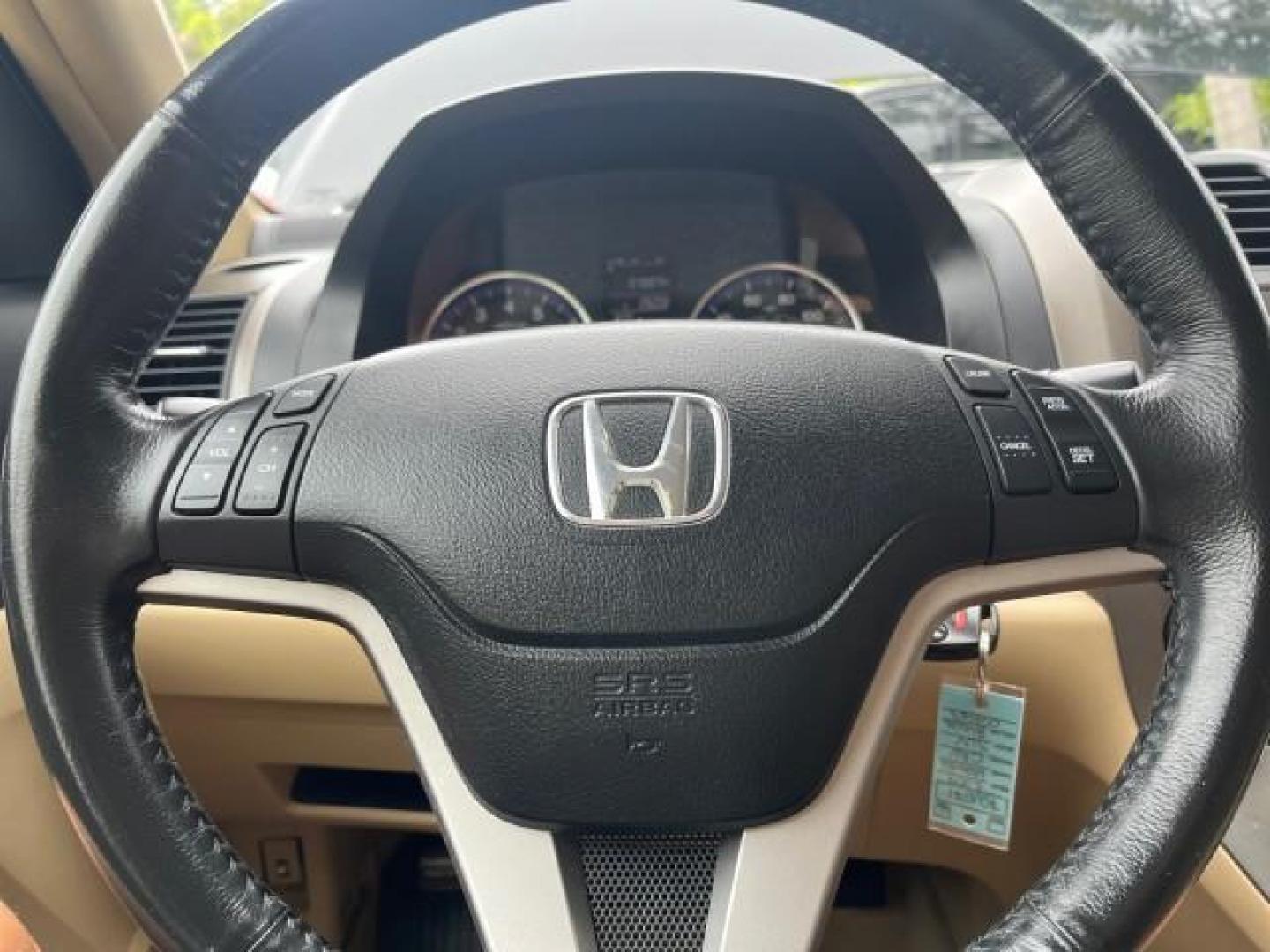 2007 Nighthawk Black Pearl /Gray Honda CR-V 1 FL EX-L LOW MILES 70,074 (JHLRE48757C) with an 2.4L DOHC MPFI 16-Valve i-VTEC I4 Engine engine, Automatic transmission, located at 4701 North Dixie Hwy, Pompano Beach, FL, 33064, (954) 422-2889, 26.240938, -80.123474 - OUR WEBPAGE FLORIDACARS1.COM HAS OVER 100 PHOTOS AND FREE CARFAX LINK 2007 HONDA CR-V EX-L ROAD READY 2.4L I4 VIN: JHLRE48757C009063 NO ACCIDENTS 4 DOOR WAGON/SPORT UTILITY 1 OWNER FLORIDA 2.4L I4 F DOHC 16V LEATHER SEATS GASOLINE 28 MPG POWER SUNROOF ALL WHEEL DRIVE ON DEMAND AWD LOW MILES 70,074 A - Photo#44