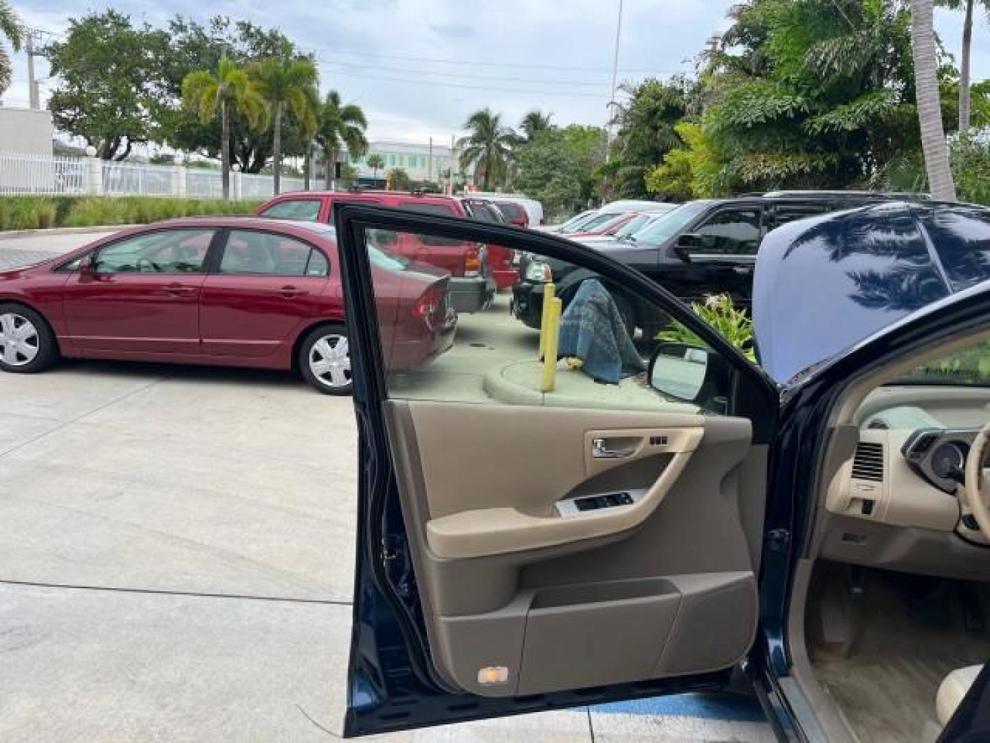 2006 Midnight Blue Pearl /Charcoal Nissan Murano 1 FL AWD SL LOW MILES 74,219 (JN8AZ08W16W) with an 3.5L DOHC MFI V6 Engine engine, Automatic transmission, located at 4701 North Dixie Hwy, Pompano Beach, FL, 33064, (954) 422-2889, 26.240938, -80.123474 - OUR WEBPAGE FLORIDACARS1.COM HAS OVER 100 PHOTOS AND FREE CARFAX LINK 2006 NISSAN MURANO S ROAD READY 3.5L V6 AWD VIN: JN8AZ08W16W531978 NO RECALLAS DUAL AC 4 DOOR WAGON/SPORT UTILITY 1 OWNER FLORIDA SUNROOF 3.5L V6 F DOHC 24V 38 SERVICE RECORDS GASOLINE ALL WHEEL DRIVE POWER LEATHER SEATS ALL WHEEL - Photo#9