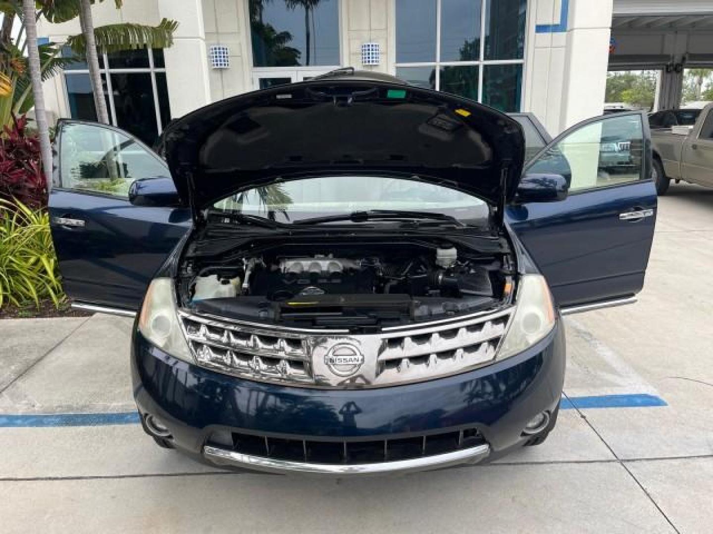 2006 Midnight Blue Pearl /Charcoal Nissan Murano 1 FL AWD SL LOW MILES 74,219 (JN8AZ08W16W) with an 3.5L DOHC MFI V6 Engine engine, Automatic transmission, located at 4701 North Dixie Hwy, Pompano Beach, FL, 33064, (954) 422-2889, 26.240938, -80.123474 - OUR WEBPAGE FLORIDACARS1.COM HAS OVER 100 PHOTOS AND FREE CARFAX LINK 2006 NISSAN MURANO S ROAD READY 3.5L V6 AWD VIN: JN8AZ08W16W531978 NO RECALLAS DUAL AC 4 DOOR WAGON/SPORT UTILITY 1 OWNER FLORIDA SUNROOF 3.5L V6 F DOHC 24V 38 SERVICE RECORDS GASOLINE ALL WHEEL DRIVE POWER LEATHER SEATS ALL WHEEL - Photo#16