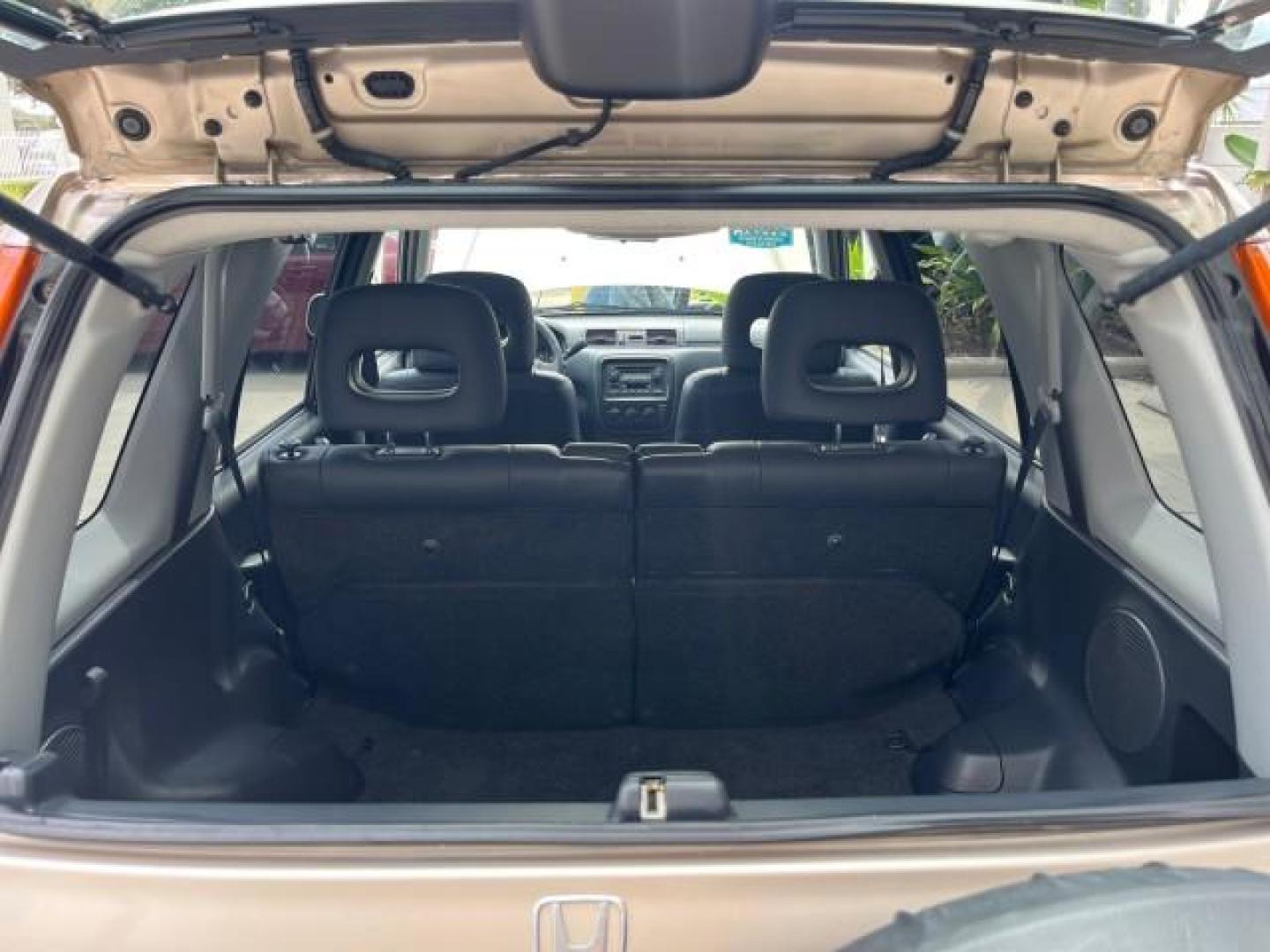 2001 Naples Gold Metallic /Gray Honda CR-V 4X4 SE LOW MILES 83,521 (JHLRD18741S) with an 2.0L DOHC MPFI 16-Valve I4 Engine engine, Automatic transmission, located at 4701 North Dixie Hwy, Pompano Beach, FL, 33064, (954) 422-2889, 26.240938, -80.123474 - OUR WEBPAGE FLORIDACARS1.COM HAS OVER 100 PHOTOS AND FREE CARFAX LINK 2001 HONDA CR-V SE ROAD READY 2.0L I4 VIN: JHLRD18741S003785 LOW MILES 83,521 4 DOOR WAGON/SPORT UTILITY ALL WHEEL DRIVE 4X4 2.0L I4 F SOHC 16V LEATHER SEATS GASOLINE 12 SERVICE RECORDS FRONT WHEEL DRIVE W/ 4X4 POWER MIRRORS AWD A - Photo#77