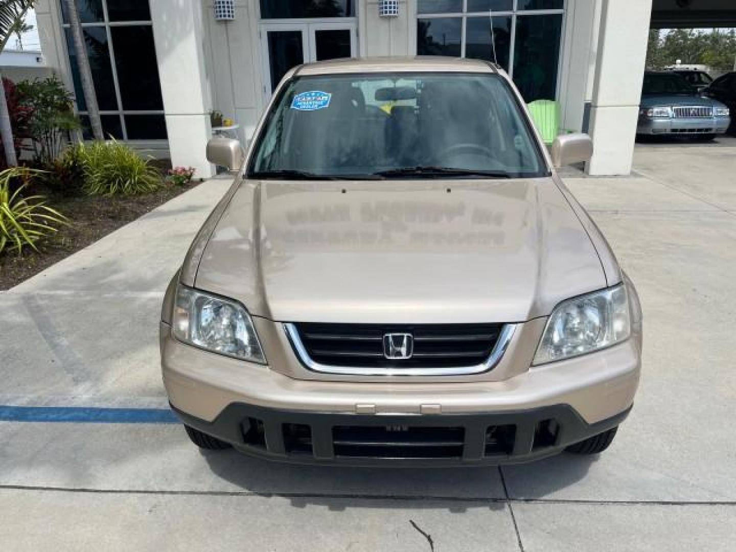 2001 Naples Gold Metallic /Gray Honda CR-V 4X4 SE LOW MILES 83,521 (JHLRD18741S) with an 2.0L DOHC MPFI 16-Valve I4 Engine engine, Automatic transmission, located at 4701 North Dixie Hwy, Pompano Beach, FL, 33064, (954) 422-2889, 26.240938, -80.123474 - OUR WEBPAGE FLORIDACARS1.COM HAS OVER 100 PHOTOS AND FREE CARFAX LINK 2001 HONDA CR-V SE ROAD READY 2.0L I4 VIN: JHLRD18741S003785 LOW MILES 83,521 4 DOOR WAGON/SPORT UTILITY ALL WHEEL DRIVE 4X4 2.0L I4 F SOHC 16V LEATHER SEATS GASOLINE 12 SERVICE RECORDS FRONT WHEEL DRIVE W/ 4X4 POWER MIRRORS AWD A - Photo#84