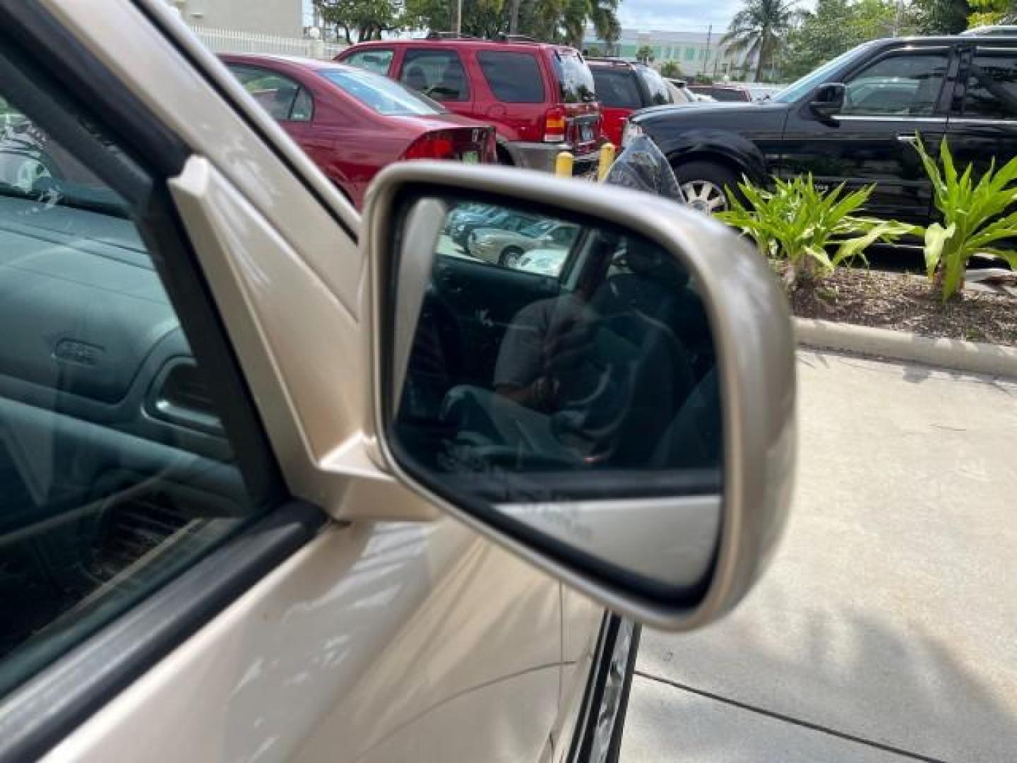 2001 Naples Gold Metallic /Gray Honda CR-V 4X4 SE LOW MILES 83,521 (JHLRD18741S) with an 2.0L DOHC MPFI 16-Valve I4 Engine engine, Automatic transmission, located at 4701 North Dixie Hwy, Pompano Beach, FL, 33064, (954) 422-2889, 26.240938, -80.123474 - OUR WEBPAGE FLORIDACARS1.COM HAS OVER 100 PHOTOS AND FREE CARFAX LINK 2001 HONDA CR-V SE ROAD READY 2.0L I4 VIN: JHLRD18741S003785 LOW MILES 83,521 4 DOOR WAGON/SPORT UTILITY ALL WHEEL DRIVE 4X4 2.0L I4 F SOHC 16V LEATHER SEATS GASOLINE 12 SERVICE RECORDS FRONT WHEEL DRIVE W/ 4X4 POWER MIRRORS AWD A - Photo#96