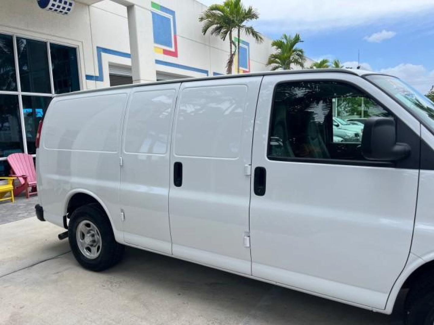 2006 Summit White /Medium Dark Pewter Chevrolet Express Cargo Van 1 FL LOW MILES 46,768 (1GCFG15X261) with an 4.3L Vortec 4300 V6 MFI Engine engine, Automatic transmission, located at 4701 North Dixie Hwy, Pompano Beach, FL, 33064, (954) 422-2889, 26.240938, -80.123474 - OUR WEBPAGE FLORIDACARS1.COM HAS OVER 100 PHOTOS AND FREE CARFAX LINK 2006 CHEVROLET EXPRESS 1500 ROAD READY WORK READY VIN: 1GCFG15X261224021 NO ACCIDENTS NO RECALLS VAN 1 OWNER FLORIDA 4.3L V6 F LOW MILES 46,768 4.3L V6 GASOLINE 10 SERVICE RECORDS REAR WHEEL DRIVE 9 FT CARGO SPACE Anti-Theft Syste - Photo#78