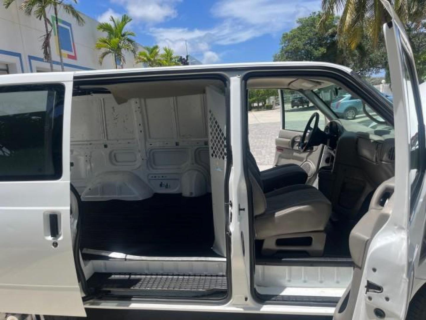 2004 Summit White /Neutral Chevrolet Astro Cargo Van LOW MILES 43,496 (1GCDM19X54B) with an 4.3L Vortec 4300 V6 MFI Engine engine, Automatic transmission, located at 4701 North Dixie Hwy, Pompano Beach, FL, 33064, (954) 422-2889, 26.240938, -80.123474 - OUR WEBPAGE FLORIDACARS1.COM HAS OVER 100 PHOTOS AND FREE CARFAX LINK 2004 CHEVROLET ASTRO ROAD READY 4.3L V6 VIN: 1GCDM19X54B119359 NO ACCIDENTS VAN NO RECALLS 4.3L V6 F LOW MILES 43,496 GASOLINE 6 SERVICE RECORDS REAR WHEEL DRIVE WORK READY Front Bucket Seats RWD THIS IS ONE OF THE NICEST CHEVY S - Photo#13