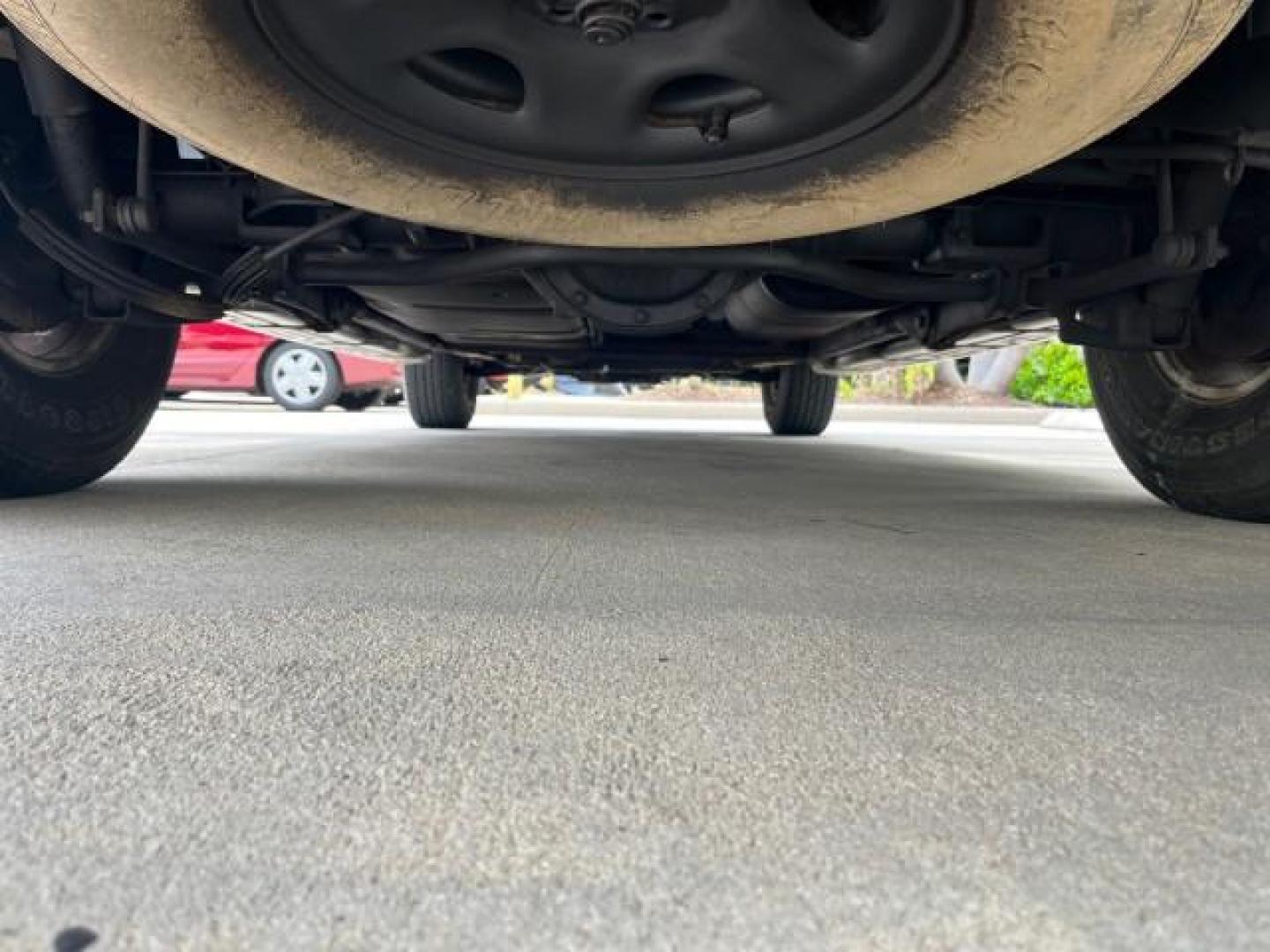 2005 Sport Red Metallic /Gray/Dark Charcoal Chevrolet Suburban LS 4X4 LOW MILES (3GNFK16Z55G) with an 5.3L Vortec 5300 V8 SFI Flex-Fuel Engine engine, Automatic transmission, located at 4701 North Dixie Hwy, Pompano Beach, FL, 33064, (954) 422-2889, 26.240938, -80.123474 - OUR WEBPAGE FLORIDACARS1.COM HAS OVER 100 PHOTOS AND FREE CARFAX LINK 2005 CHEVROLET SUBURBAN 1500 LS NEW $ 42,160 ROAD READY VIN: 3GNFK16Z55G214878 NO ACCIDENTS 5.3L V8 4 DOOR WAGON/SPORT UTILITY NO RECALLS 4X4 5.3L V8 F 3 ROW SEATS FLEX FUEL DUAL AC POWER SEATS/MIRRORS REAR WHEEL DRIVE W/ 4X4 LOW - Photo#22