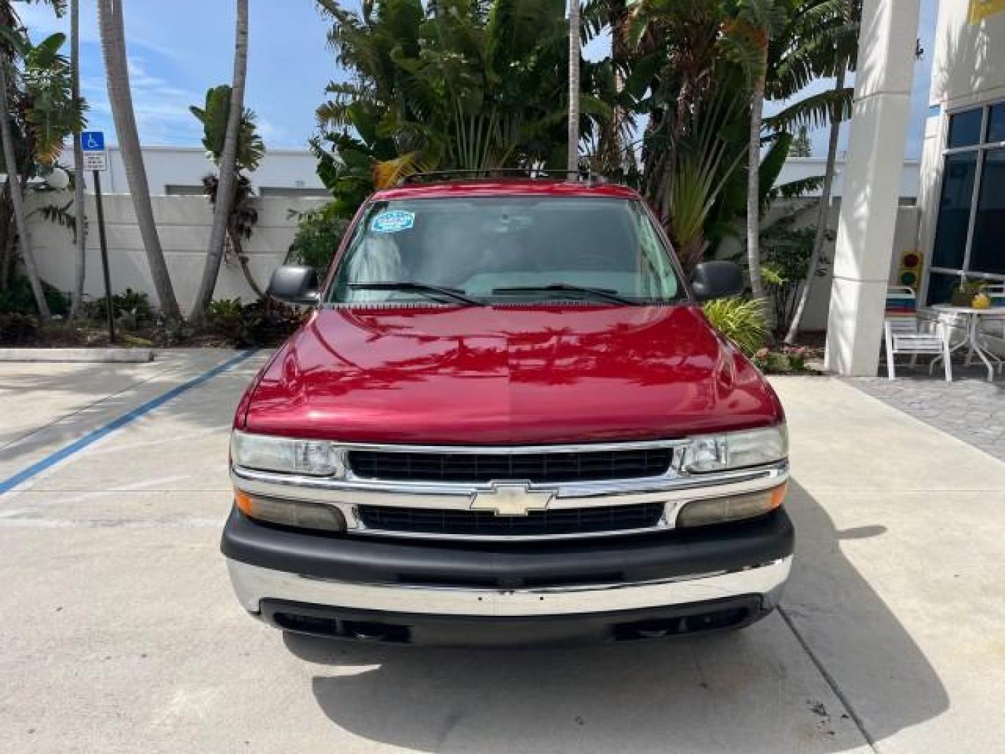 2005 Sport Red Metallic /Gray/Dark Charcoal Chevrolet Suburban LS 4X4 LOW MILES (3GNFK16Z55G) with an 5.3L Vortec 5300 V8 SFI Flex-Fuel Engine engine, Automatic transmission, located at 4701 North Dixie Hwy, Pompano Beach, FL, 33064, (954) 422-2889, 26.240938, -80.123474 - OUR WEBPAGE FLORIDACARS1.COM HAS OVER 100 PHOTOS AND FREE CARFAX LINK 2005 CHEVROLET SUBURBAN 1500 LS NEW $ 42,160 ROAD READY VIN: 3GNFK16Z55G214878 NO ACCIDENTS 5.3L V8 4 DOOR WAGON/SPORT UTILITY NO RECALLS 4X4 5.3L V8 F 3 ROW SEATS FLEX FUEL DUAL AC POWER SEATS/MIRRORS REAR WHEEL DRIVE W/ 4X4 LOW - Photo#2