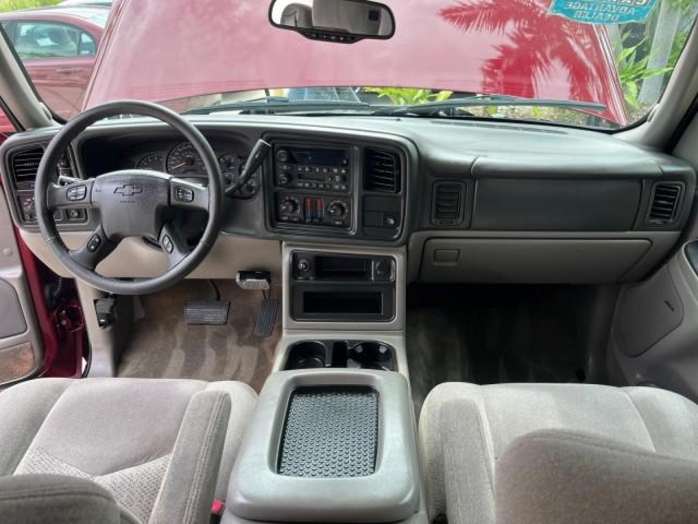 2005 Sport Red Metallic /Gray/Dark Charcoal Chevrolet Suburban LS 4X4 LOW MILES (3GNFK16Z55G) with an 5.3L Vortec 5300 V8 SFI Flex-Fuel Engine engine, Automatic transmission, located at 4701 North Dixie Hwy, Pompano Beach, FL, 33064, (954) 422-2889, 26.240938, -80.123474 - OUR WEBPAGE FLORIDACARS1.COM HAS OVER 100 PHOTOS AND FREE CARFAX LINK 2005 CHEVROLET SUBURBAN 1500 LS NEW $ 42,160 ROAD READY VIN: 3GNFK16Z55G214878 NO ACCIDENTS 5.3L V8 4 DOOR WAGON/SPORT UTILITY NO RECALLS 4X4 5.3L V8 F 3 ROW SEATS FLEX FUEL DUAL AC POWER SEATS/MIRRORS REAR WHEEL DRIVE W/ 4X4 LOW - Photo#33