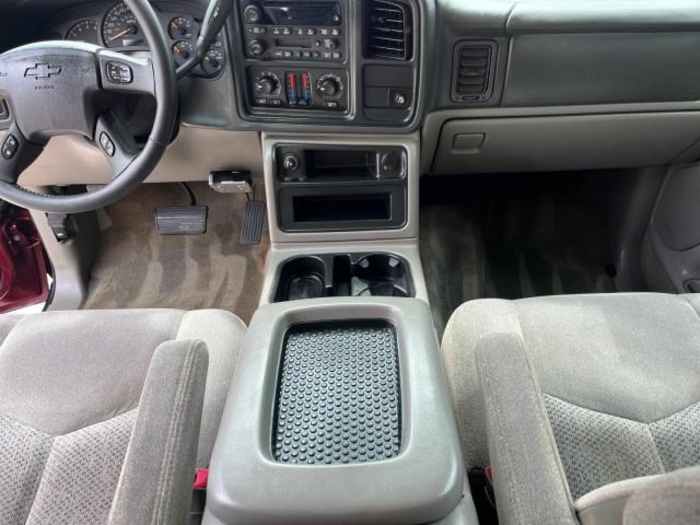 2005 Sport Red Metallic /Gray/Dark Charcoal Chevrolet Suburban LS 4X4 LOW MILES (3GNFK16Z55G) with an 5.3L Vortec 5300 V8 SFI Flex-Fuel Engine engine, Automatic transmission, located at 4701 North Dixie Hwy, Pompano Beach, FL, 33064, (954) 422-2889, 26.240938, -80.123474 - OUR WEBPAGE FLORIDACARS1.COM HAS OVER 100 PHOTOS AND FREE CARFAX LINK 2005 CHEVROLET SUBURBAN 1500 LS NEW $ 42,160 ROAD READY VIN: 3GNFK16Z55G214878 NO ACCIDENTS 5.3L V8 4 DOOR WAGON/SPORT UTILITY NO RECALLS 4X4 5.3L V8 F 3 ROW SEATS FLEX FUEL DUAL AC POWER SEATS/MIRRORS REAR WHEEL DRIVE W/ 4X4 LOW - Photo#35