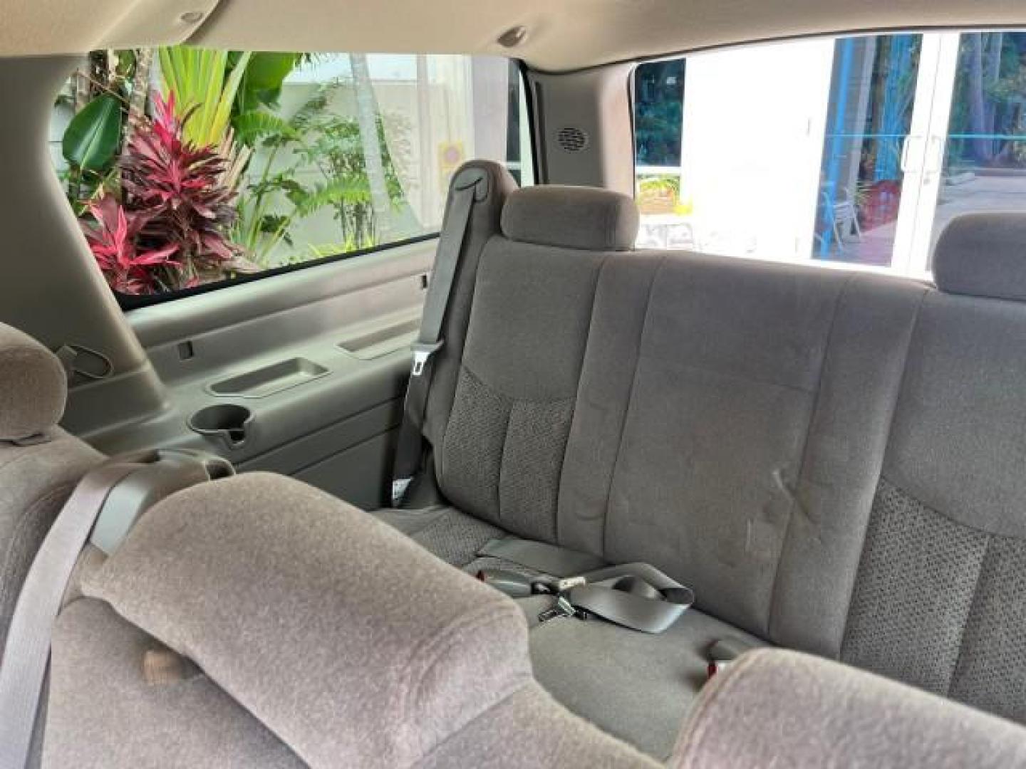 2005 Sport Red Metallic /Gray/Dark Charcoal Chevrolet Suburban LS 4X4 LOW MILES (3GNFK16Z55G) with an 5.3L Vortec 5300 V8 SFI Flex-Fuel Engine engine, Automatic transmission, located at 4701 North Dixie Hwy, Pompano Beach, FL, 33064, (954) 422-2889, 26.240938, -80.123474 - OUR WEBPAGE FLORIDACARS1.COM HAS OVER 100 PHOTOS AND FREE CARFAX LINK 2005 CHEVROLET SUBURBAN 1500 LS NEW $ 42,160 ROAD READY VIN: 3GNFK16Z55G214878 NO ACCIDENTS 5.3L V8 4 DOOR WAGON/SPORT UTILITY NO RECALLS 4X4 5.3L V8 F 3 ROW SEATS FLEX FUEL DUAL AC POWER SEATS/MIRRORS REAR WHEEL DRIVE W/ 4X4 LOW - Photo#38