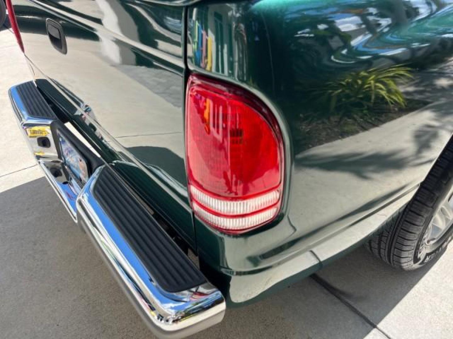 2001 Forest Green Pearl /Dark Slate Gray Dodge Dakota 1 FL SLT LOW MILES 85,601 (1B7GL22X51S) with an 3.9L SMPI V6 Magnum Engine engine, Automatic transmission, located at 4701 North Dixie Hwy, Pompano Beach, FL, 33064, (954) 422-2889, 26.240938, -80.123474 - OUR WEBPAGE FLORIDACARS1.COM HAS OVER 100 PHOTOS AND FREE CARFAX LINK 2001 DODGE DAKOTA AC FIBERGLASS TONNEAU COVER EASILY REMOVES IF NEEDED ROAD READY 3.9L V6 VIN: 1B7GL22X51S342576 NO ACCIDENTS CLUB CAB PICKUP 1 OWNER FLORIDA 3.9L V6 F OHV LOW MILES 85,601 GASOLINE 6,5 FT BED LENGTH REAR WHEEL DRI - Photo#87