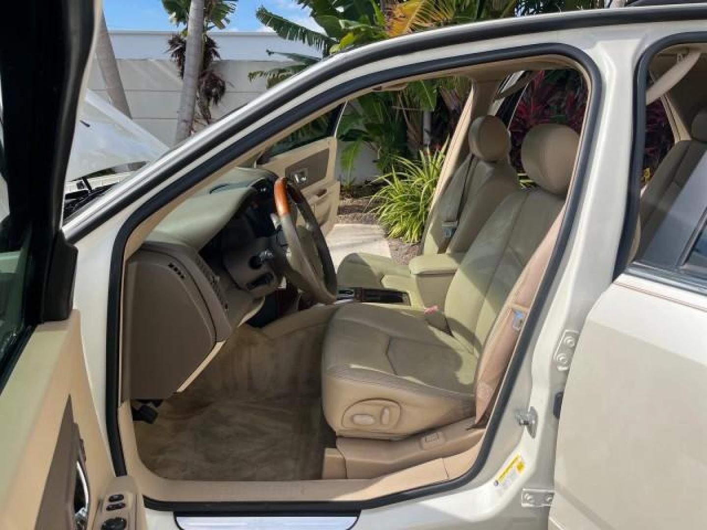 2006 White Diamond /Cashmere Cadillac SRX V 8 LOW MILES 63,331 (1GYEE63A560) with an 4.6L Northstar V8 VVT SFI Engine engine, Automatic transmission, located at 4701 North Dixie Hwy, Pompano Beach, FL, 33064, (954) 422-2889, 26.240938, -80.123474 - OUR WEBPAGE FLORIDACARS1.COM HAS OVER 100 PHOTOS AND FREE CARFAX LINK 2006 CADILLAC SRX NEW $ 48,695 ROAD READY VIN: 1GYEE63A560166824 NO RECALLS FLORIDA OWNER 4 DOOR WAGON/SPORT UTILITY LOW MILES 63,331 4.6L V8 4.6L V8 F POWER LIFTGATE POWER LEATHER SEATS/MIRRORS GASOLINE PARKING SENSORS PANORAMIC - Photo#10