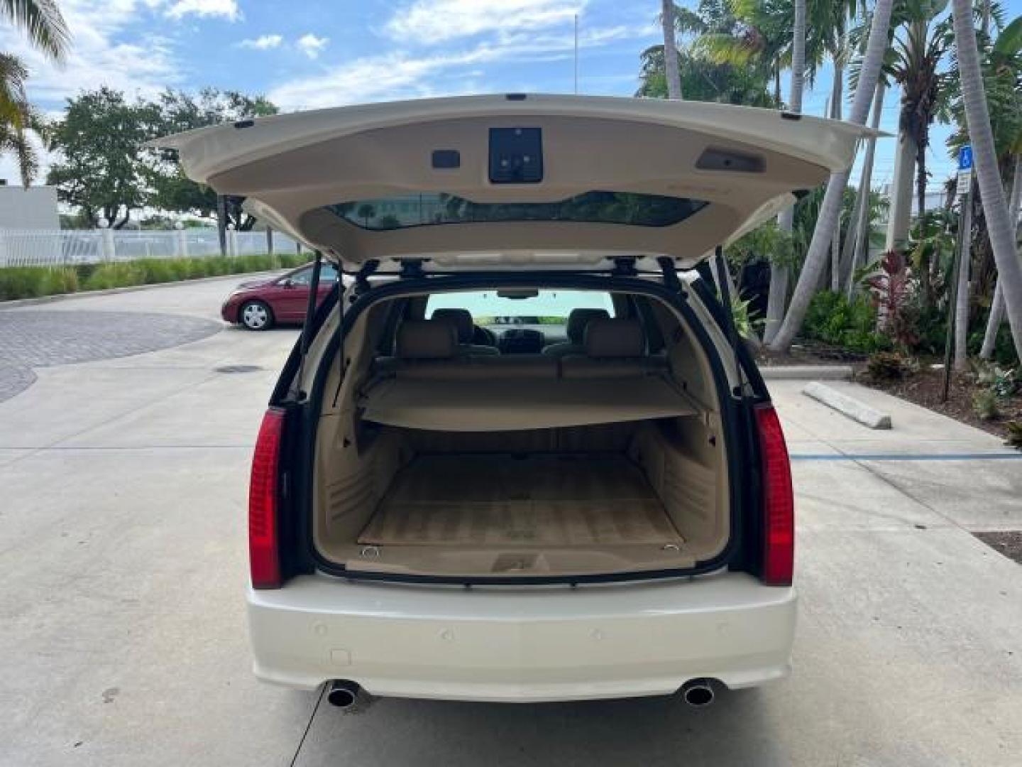 2006 White Diamond /Cashmere Cadillac SRX V 8 LOW MILES 63,331 (1GYEE63A560) with an 4.6L Northstar V8 VVT SFI Engine engine, Automatic transmission, located at 4701 North Dixie Hwy, Pompano Beach, FL, 33064, (954) 422-2889, 26.240938, -80.123474 - OUR WEBPAGE FLORIDACARS1.COM HAS OVER 100 PHOTOS AND FREE CARFAX LINK 2006 CADILLAC SRX NEW $ 48,695 ROAD READY VIN: 1GYEE63A560166824 NO RECALLS FLORIDA OWNER 4 DOOR WAGON/SPORT UTILITY LOW MILES 63,331 4.6L V8 4.6L V8 F POWER LIFTGATE POWER LEATHER SEATS/MIRRORS GASOLINE PARKING SENSORS PANORAMIC - Photo#63