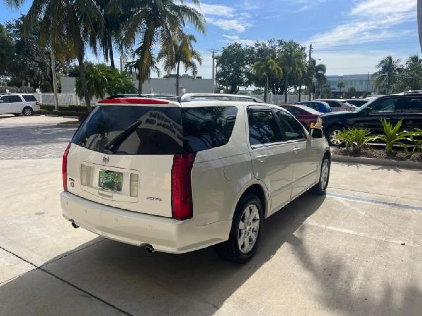 2006 White Diamond /Cashmere Cadillac SRX V 8 LOW MILES 63,331 (1GYEE63A560) with an 4.6L Northstar V8 VVT SFI Engine engine, Automatic transmission, located at 4701 North Dixie Hwy, Pompano Beach, FL, 33064, (954) 422-2889, 26.240938, -80.123474 - OUR WEBPAGE FLORIDACARS1.COM HAS OVER 100 PHOTOS AND FREE CARFAX LINK 2006 CADILLAC SRX NEW $ 48,695 ROAD READY VIN: 1GYEE63A560166824 NO RECALLS FLORIDA OWNER 4 DOOR WAGON/SPORT UTILITY LOW MILES 63,331 4.6L V8 4.6L V8 F POWER LIFTGATE POWER LEATHER SEATS/MIRRORS GASOLINE PARKING SENSORS PANORAMIC - Photo#7