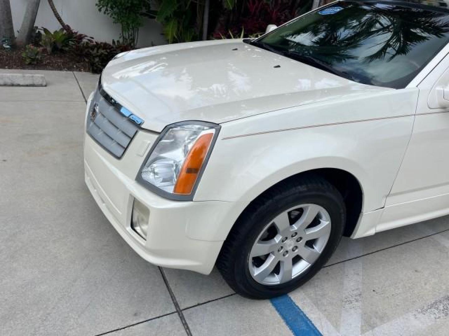 2006 White Diamond /Cashmere Cadillac SRX V 8 LOW MILES 63,331 (1GYEE63A560) with an 4.6L Northstar V8 VVT SFI Engine engine, Automatic transmission, located at 4701 North Dixie Hwy, Pompano Beach, FL, 33064, (954) 422-2889, 26.240938, -80.123474 - OUR WEBPAGE FLORIDACARS1.COM HAS OVER 100 PHOTOS AND FREE CARFAX LINK 2006 CADILLAC SRX NEW $ 48,695 ROAD READY VIN: 1GYEE63A560166824 NO RECALLS FLORIDA OWNER 4 DOOR WAGON/SPORT UTILITY LOW MILES 63,331 4.6L V8 4.6L V8 F POWER LIFTGATE POWER LEATHER SEATS/MIRRORS GASOLINE PARKING SENSORS PANORAMIC - Photo#83