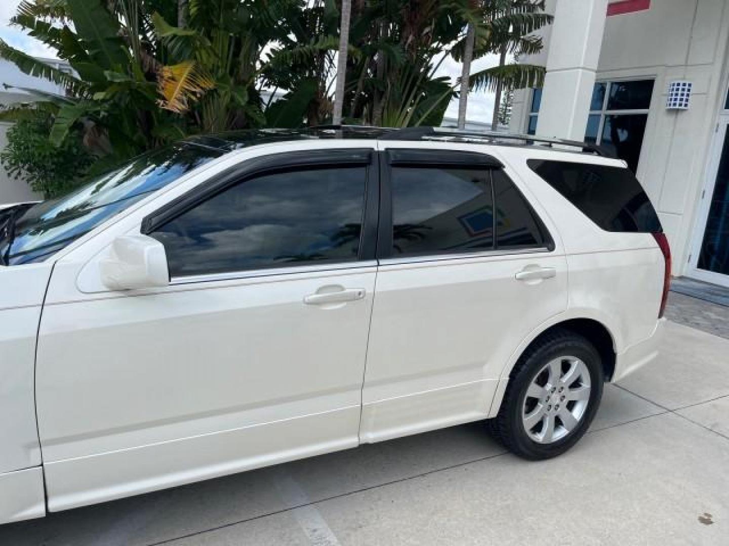 2006 White Diamond /Cashmere Cadillac SRX V 8 LOW MILES 63,331 (1GYEE63A560) with an 4.6L Northstar V8 VVT SFI Engine engine, Automatic transmission, located at 4701 North Dixie Hwy, Pompano Beach, FL, 33064, (954) 422-2889, 26.240938, -80.123474 - OUR WEBPAGE FLORIDACARS1.COM HAS OVER 100 PHOTOS AND FREE CARFAX LINK 2006 CADILLAC SRX NEW $ 48,695 ROAD READY VIN: 1GYEE63A560166824 NO RECALLS FLORIDA OWNER 4 DOOR WAGON/SPORT UTILITY LOW MILES 63,331 4.6L V8 4.6L V8 F POWER LIFTGATE POWER LEATHER SEATS/MIRRORS GASOLINE PARKING SENSORS PANORAMIC - Photo#84