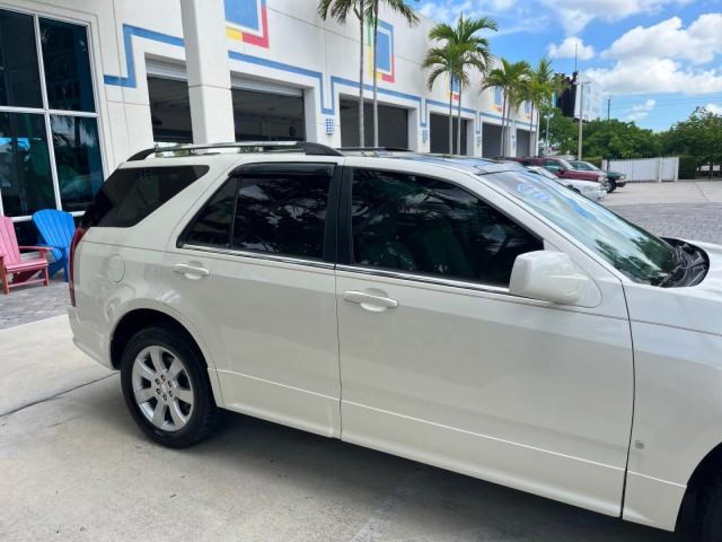 2006 White Diamond /Cashmere Cadillac SRX V 8 LOW MILES 63,331 (1GYEE63A560) with an 4.6L Northstar V8 VVT SFI Engine engine, Automatic transmission, located at 4701 North Dixie Hwy, Pompano Beach, FL, 33064, (954) 422-2889, 26.240938, -80.123474 - OUR WEBPAGE FLORIDACARS1.COM HAS OVER 100 PHOTOS AND FREE CARFAX LINK 2006 CADILLAC SRX NEW $ 48,695 ROAD READY VIN: 1GYEE63A560166824 NO RECALLS FLORIDA OWNER 4 DOOR WAGON/SPORT UTILITY LOW MILES 63,331 4.6L V8 4.6L V8 F POWER LIFTGATE POWER LEATHER SEATS/MIRRORS GASOLINE PARKING SENSORS PANORAMIC - Photo#85