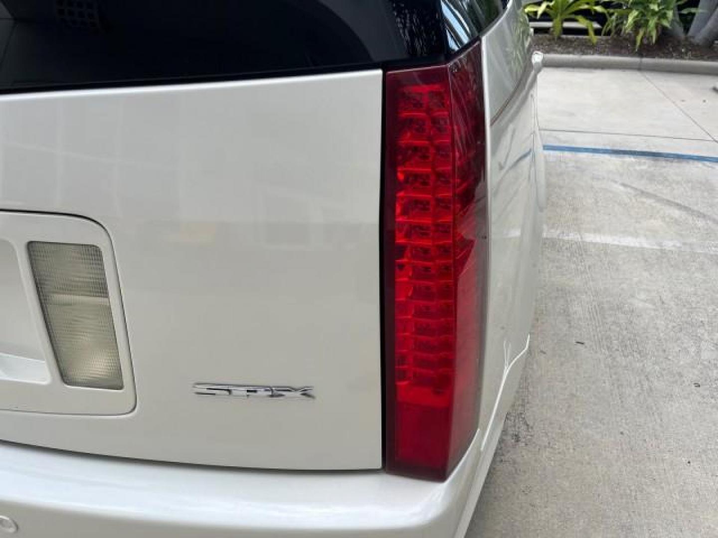 2006 White Diamond /Cashmere Cadillac SRX V 8 LOW MILES 63,331 (1GYEE63A560) with an 4.6L Northstar V8 VVT SFI Engine engine, Automatic transmission, located at 4701 North Dixie Hwy, Pompano Beach, FL, 33064, (954) 422-2889, 26.240938, -80.123474 - OUR WEBPAGE FLORIDACARS1.COM HAS OVER 100 PHOTOS AND FREE CARFAX LINK 2006 CADILLAC SRX NEW $ 48,695 ROAD READY VIN: 1GYEE63A560166824 NO RECALLS FLORIDA OWNER 4 DOOR WAGON/SPORT UTILITY LOW MILES 63,331 4.6L V8 4.6L V8 F POWER LIFTGATE POWER LEATHER SEATS/MIRRORS GASOLINE PARKING SENSORS PANORAMIC - Photo#96