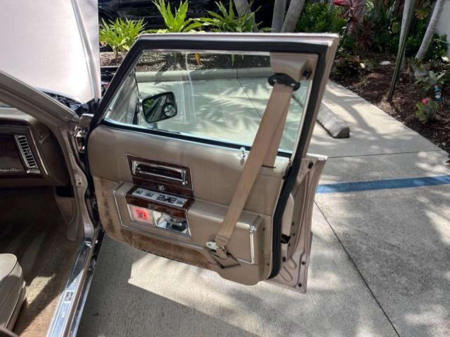 1991 TAN /TAN Cadillac Brougham DE ELEGANCE LOW MILES 61,064 (1G6DW54E4MR) with an 5.0L Throttle Body Injection V8 Engine engine, Automatic transmission, located at 4701 North Dixie Hwy, Pompano Beach, FL, 33064, (954) 422-2889, 26.240938, -80.123474 - OUR WEBPAGE FLORIDACARS1.COM HAS OVER 100 PHOTOS AND FREE CARFAX LINK 1991 CADILLAC BROUGHAM ROAD READY 5.0L V8 VIN: 1G6DW54E4MR704063 NO ACCIDENTS NO RECALLS SEDAN 4 DR LOW MILES 61,064 5.0L V8 F OHV 16V POWER LEATHER SEATS GASOLINE POWER MIRRORS REAR WHEEL DRIVE CLEAN REAR FIND 9 SERVICE RECORDS A - Photo#11