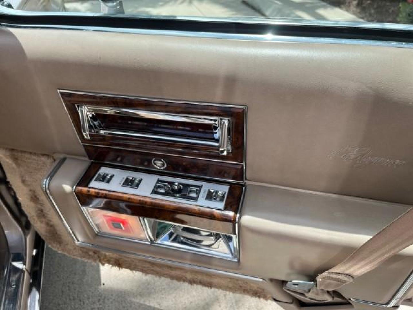 1991 TAN /TAN Cadillac Brougham DE ELEGANCE LOW MILES 61,064 (1G6DW54E4MR) with an 5.0L Throttle Body Injection V8 Engine engine, Automatic transmission, located at 4701 North Dixie Hwy, Pompano Beach, FL, 33064, (954) 422-2889, 26.240938, -80.123474 - OUR WEBPAGE FLORIDACARS1.COM HAS OVER 100 PHOTOS AND FREE CARFAX LINK 1991 CADILLAC BROUGHAM ROAD READY 5.0L V8 VIN: 1G6DW54E4MR704063 NO ACCIDENTS NO RECALLS SEDAN 4 DR LOW MILES 61,064 5.0L V8 F OHV 16V POWER LEATHER SEATS GASOLINE POWER MIRRORS REAR WHEEL DRIVE CLEAN REAR FIND 9 SERVICE RECORDS A - Photo#24