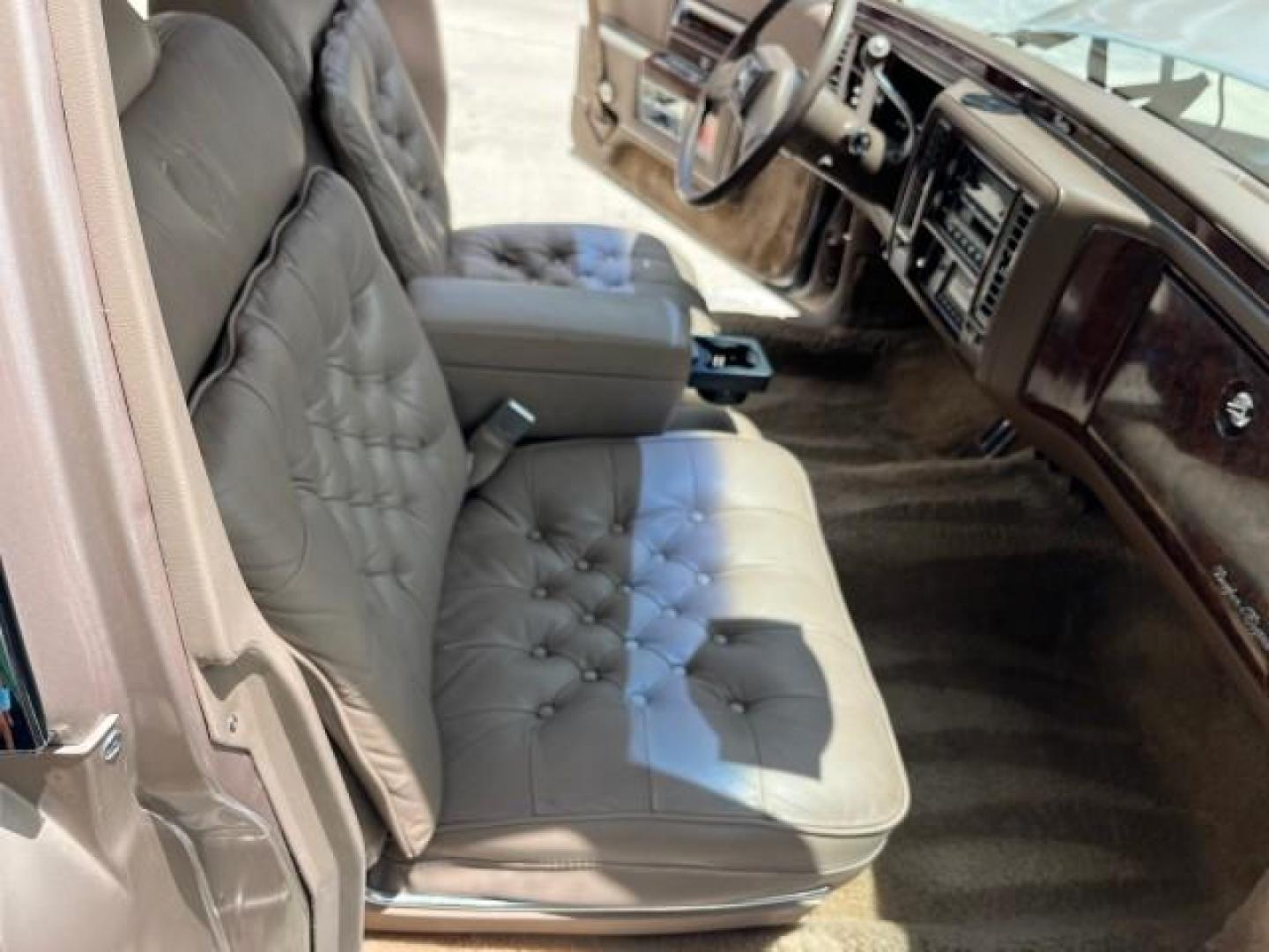 1991 TAN /TAN Cadillac Brougham DE ELEGANCE LOW MILES 61,064 (1G6DW54E4MR) with an 5.0L Throttle Body Injection V8 Engine engine, Automatic transmission, located at 4701 North Dixie Hwy, Pompano Beach, FL, 33064, (954) 422-2889, 26.240938, -80.123474 - OUR WEBPAGE FLORIDACARS1.COM HAS OVER 100 PHOTOS AND FREE CARFAX LINK 1991 CADILLAC BROUGHAM ROAD READY 5.0L V8 VIN: 1G6DW54E4MR704063 NO ACCIDENTS NO RECALLS SEDAN 4 DR LOW MILES 61,064 5.0L V8 F OHV 16V POWER LEATHER SEATS GASOLINE POWER MIRRORS REAR WHEEL DRIVE CLEAN REAR FIND 9 SERVICE RECORDS A - Photo#27