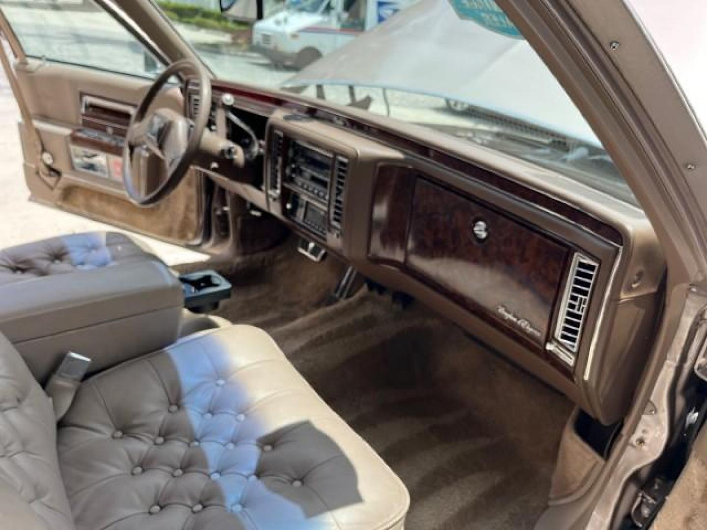 1991 TAN /TAN Cadillac Brougham DE ELEGANCE LOW MILES 61,064 (1G6DW54E4MR) with an 5.0L Throttle Body Injection V8 Engine engine, Automatic transmission, located at 4701 North Dixie Hwy, Pompano Beach, FL, 33064, (954) 422-2889, 26.240938, -80.123474 - OUR WEBPAGE FLORIDACARS1.COM HAS OVER 100 PHOTOS AND FREE CARFAX LINK 1991 CADILLAC BROUGHAM ROAD READY 5.0L V8 VIN: 1G6DW54E4MR704063 NO ACCIDENTS NO RECALLS SEDAN 4 DR LOW MILES 61,064 5.0L V8 F OHV 16V POWER LEATHER SEATS GASOLINE POWER MIRRORS REAR WHEEL DRIVE CLEAN REAR FIND 9 SERVICE RECORDS A - Photo#28