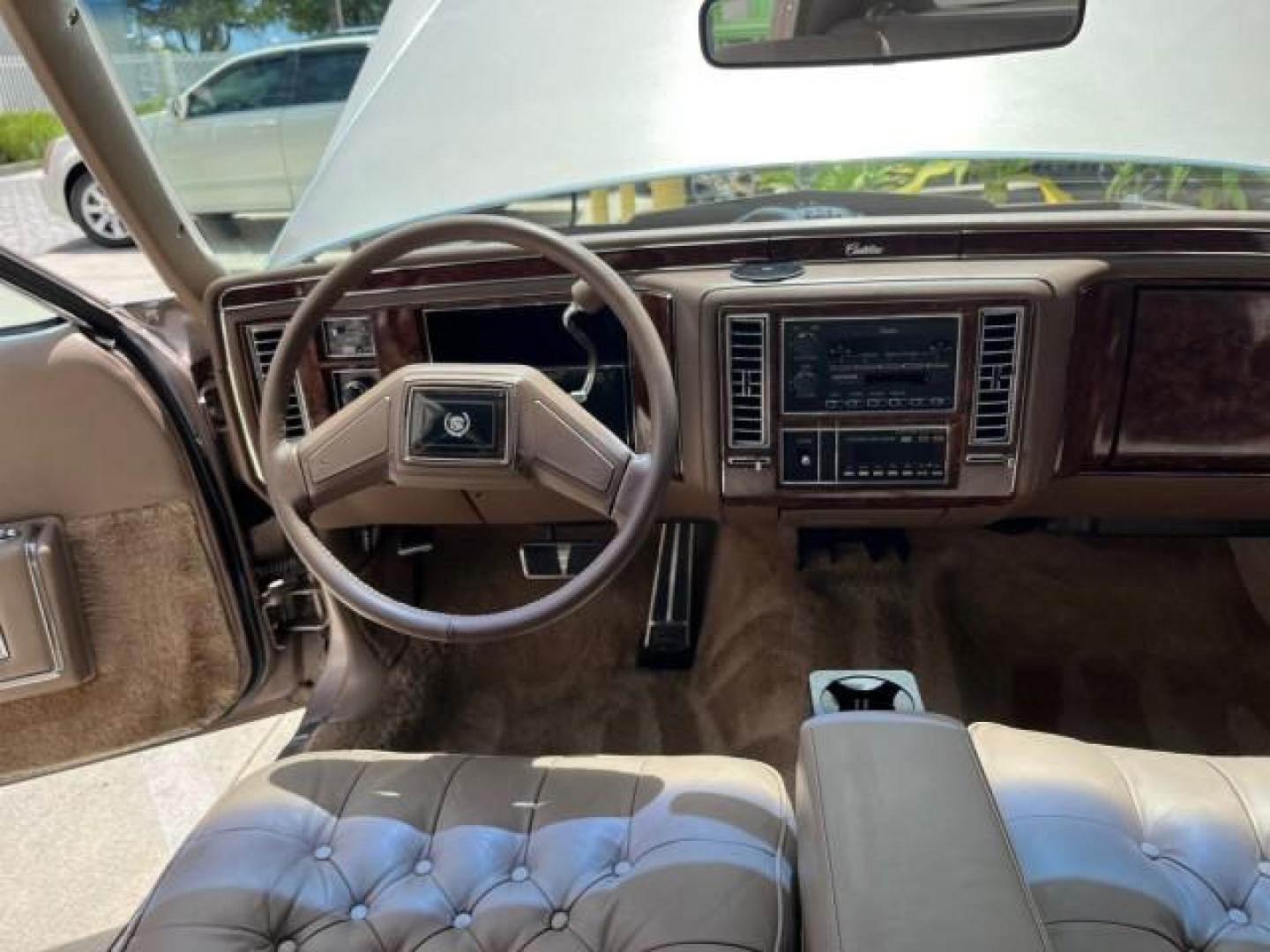 1991 TAN /TAN Cadillac Brougham DE ELEGANCE LOW MILES 61,064 (1G6DW54E4MR) with an 5.0L Throttle Body Injection V8 Engine engine, Automatic transmission, located at 4701 North Dixie Hwy, Pompano Beach, FL, 33064, (954) 422-2889, 26.240938, -80.123474 - OUR WEBPAGE FLORIDACARS1.COM HAS OVER 100 PHOTOS AND FREE CARFAX LINK 1991 CADILLAC BROUGHAM ROAD READY 5.0L V8 VIN: 1G6DW54E4MR704063 NO ACCIDENTS NO RECALLS SEDAN 4 DR LOW MILES 61,064 5.0L V8 F OHV 16V POWER LEATHER SEATS GASOLINE POWER MIRRORS REAR WHEEL DRIVE CLEAN REAR FIND 9 SERVICE RECORDS A - Photo#36