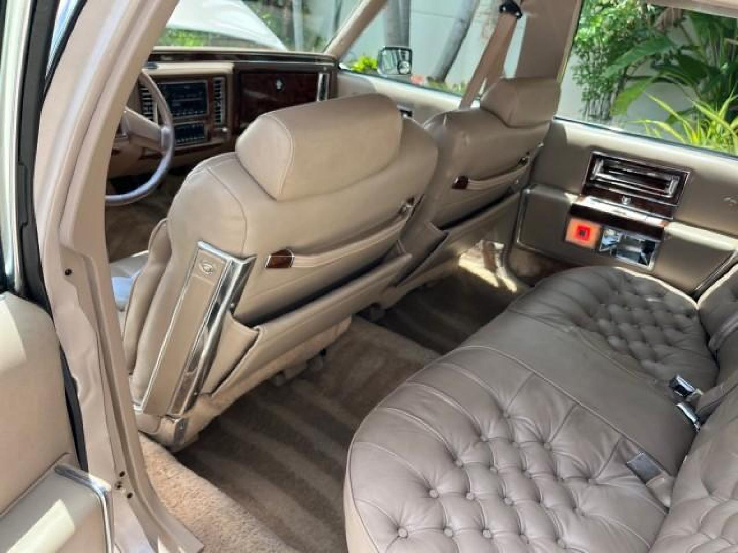 1991 TAN /TAN Cadillac Brougham DE ELEGANCE LOW MILES 61,064 (1G6DW54E4MR) with an 5.0L Throttle Body Injection V8 Engine engine, Automatic transmission, located at 4701 North Dixie Hwy, Pompano Beach, FL, 33064, (954) 422-2889, 26.240938, -80.123474 - OUR WEBPAGE FLORIDACARS1.COM HAS OVER 100 PHOTOS AND FREE CARFAX LINK 1991 CADILLAC BROUGHAM ROAD READY 5.0L V8 VIN: 1G6DW54E4MR704063 NO ACCIDENTS NO RECALLS SEDAN 4 DR LOW MILES 61,064 5.0L V8 F OHV 16V POWER LEATHER SEATS GASOLINE POWER MIRRORS REAR WHEEL DRIVE CLEAN REAR FIND 9 SERVICE RECORDS A - Photo#39