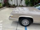 1991 TAN /TAN Cadillac Brougham DE ELEGANCE LOW MILES 61,064 (1G6DW54E4MR) with an 5.0L Throttle Body Injection V8 Engine engine, Automatic transmission, located at 4701 North Dixie Hwy, Pompano Beach, FL, 33064, (954) 422-2889, 26.240938, -80.123474 - OUR WEBPAGE FLORIDACARS1.COM HAS OVER 100 PHOTOS AND FREE CARFAX LINK 1991 CADILLAC BROUGHAM ROAD READY 5.0L V8 VIN: 1G6DW54E4MR704063 NO ACCIDENTS NO RECALLS SEDAN 4 DR LOW MILES 61,064 5.0L V8 F OHV 16V POWER LEATHER SEATS GASOLINE POWER MIRRORS REAR WHEEL DRIVE CLEAN REAR FIND 9 SERVICE RECORDS A - Photo#80