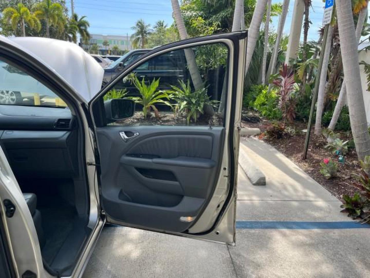 2006 Sage Brush Pearl /Gray Honda Odyssey EX-L LOW MILES 61,166 (5FNRL38696B) with an 3.5L SOHC MPFI 24-Valve i-VTEC V6 Engine engine, Automatic transmission, located at 4701 North Dixie Hwy, Pompano Beach, FL, 33064, (954) 422-2889, 26.240938, -80.123474 - OUR WEBPAGE FLORIDACARS1.COM HAS OVER 100 PHOTOS AND FREE CARFAX LINK 2006 HONDA ODYSSEY EX-L ROAD READY 3.5L V6 VIN: 5FNRL38696B408340 NO RECALLS 28 MPG VAN POWER SLIDING DOORS 3.5L V6 F SOHC 24V 3 ROW LEATHER SEATS GASOLINE LOW MILES 61,166 POWER SUNROOF/MIRRORS FRONT WHEEL DRIVE 1 OWNER 23 SERVIC - Photo#11