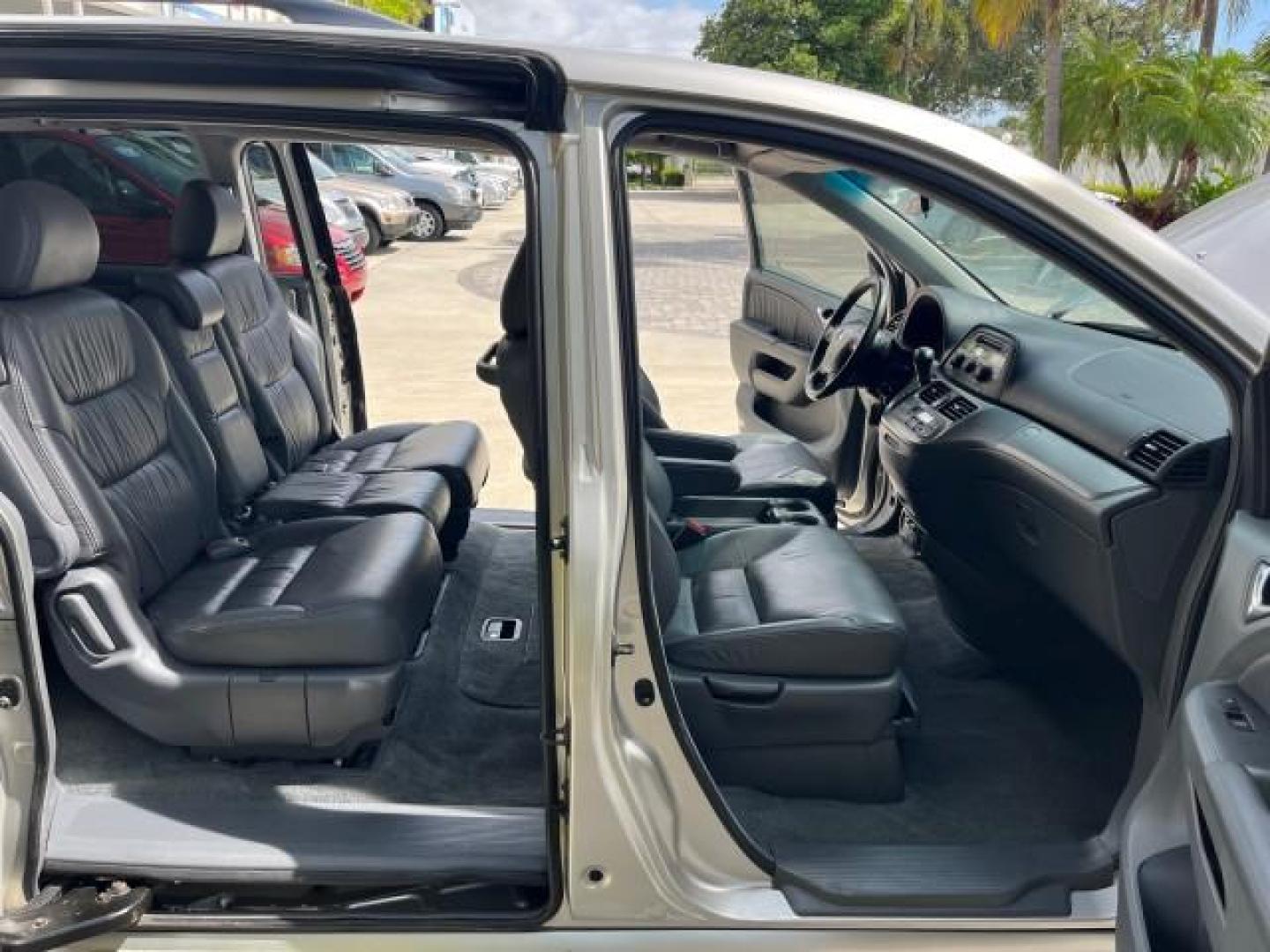 2006 Sage Brush Pearl /Gray Honda Odyssey EX-L LOW MILES 61,166 (5FNRL38696B) with an 3.5L SOHC MPFI 24-Valve i-VTEC V6 Engine engine, Automatic transmission, located at 4701 North Dixie Hwy, Pompano Beach, FL, 33064, (954) 422-2889, 26.240938, -80.123474 - OUR WEBPAGE FLORIDACARS1.COM HAS OVER 100 PHOTOS AND FREE CARFAX LINK 2006 HONDA ODYSSEY EX-L ROAD READY 3.5L V6 VIN: 5FNRL38696B408340 NO RECALLS 28 MPG VAN POWER SLIDING DOORS 3.5L V6 F SOHC 24V 3 ROW LEATHER SEATS GASOLINE LOW MILES 61,166 POWER SUNROOF/MIRRORS FRONT WHEEL DRIVE 1 OWNER 23 SERVIC - Photo#12