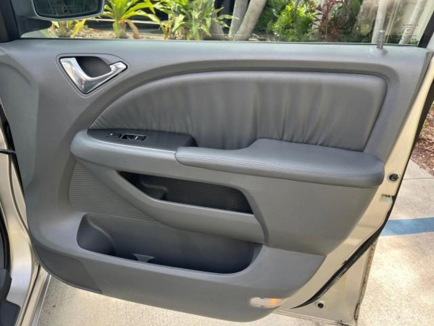 2006 Sage Brush Pearl /Gray Honda Odyssey EX-L LOW MILES 61,166 (5FNRL38696B) with an 3.5L SOHC MPFI 24-Valve i-VTEC V6 Engine engine, Automatic transmission, located at 4701 North Dixie Hwy, Pompano Beach, FL, 33064, (954) 422-2889, 26.240938, -80.123474 - OUR WEBPAGE FLORIDACARS1.COM HAS OVER 100 PHOTOS AND FREE CARFAX LINK 2006 HONDA ODYSSEY EX-L ROAD READY 3.5L V6 VIN: 5FNRL38696B408340 NO RECALLS 28 MPG VAN POWER SLIDING DOORS 3.5L V6 F SOHC 24V 3 ROW LEATHER SEATS GASOLINE LOW MILES 61,166 POWER SUNROOF/MIRRORS FRONT WHEEL DRIVE 1 OWNER 23 SERVIC - Photo#24