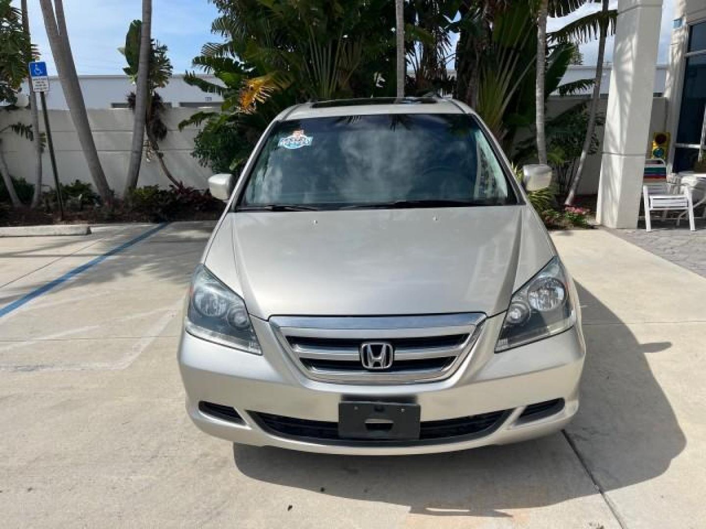 2006 Sage Brush Pearl /Gray Honda Odyssey EX-L LOW MILES 61,166 (5FNRL38696B) with an 3.5L SOHC MPFI 24-Valve i-VTEC V6 Engine engine, Automatic transmission, located at 4701 North Dixie Hwy, Pompano Beach, FL, 33064, (954) 422-2889, 26.240938, -80.123474 - OUR WEBPAGE FLORIDACARS1.COM HAS OVER 100 PHOTOS AND FREE CARFAX LINK 2006 HONDA ODYSSEY EX-L ROAD READY 3.5L V6 VIN: 5FNRL38696B408340 NO RECALLS 28 MPG VAN POWER SLIDING DOORS 3.5L V6 F SOHC 24V 3 ROW LEATHER SEATS GASOLINE LOW MILES 61,166 POWER SUNROOF/MIRRORS FRONT WHEEL DRIVE 1 OWNER 23 SERVIC - Photo#2