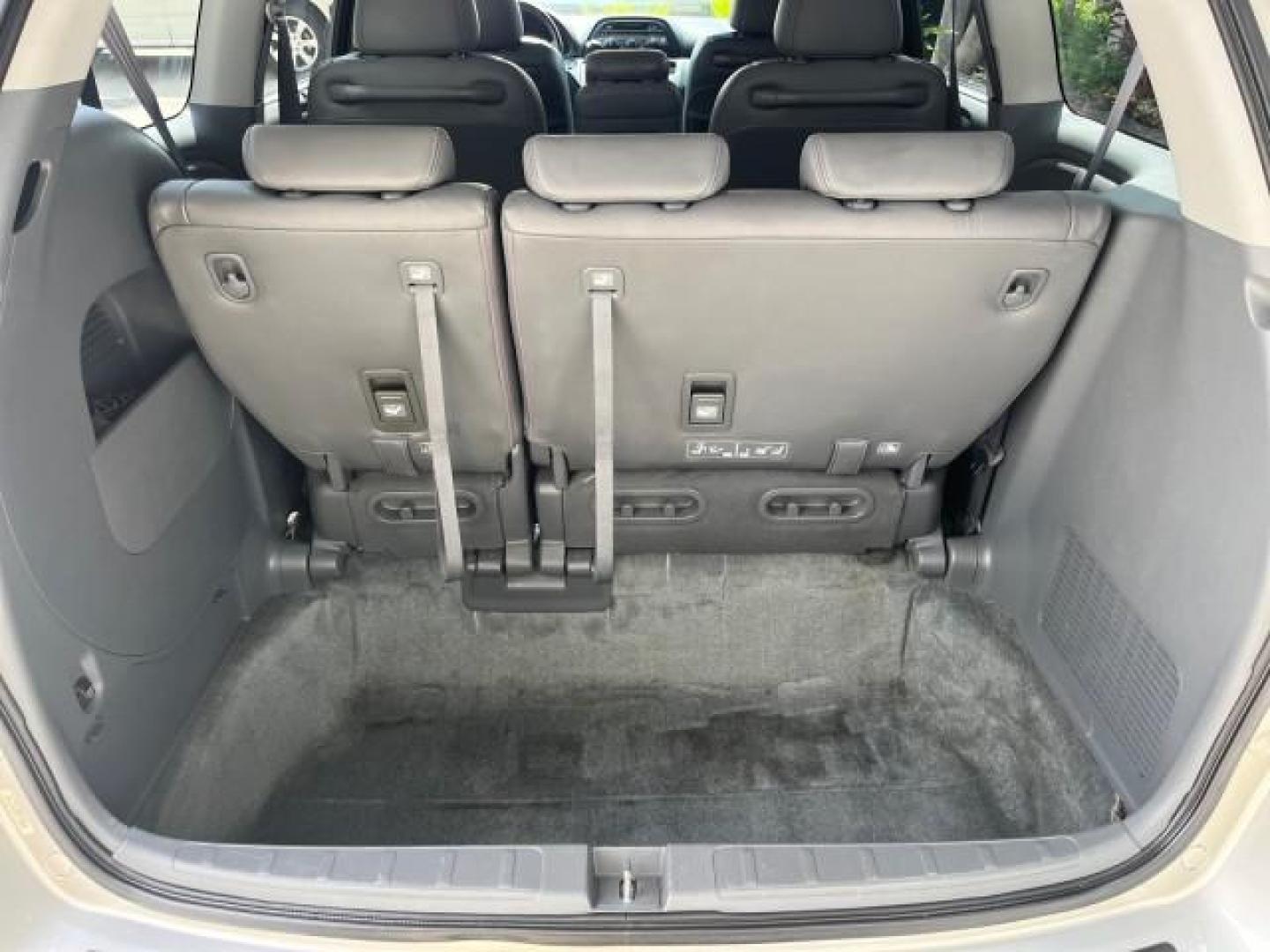 2006 Sage Brush Pearl /Gray Honda Odyssey EX-L LOW MILES 61,166 (5FNRL38696B) with an 3.5L SOHC MPFI 24-Valve i-VTEC V6 Engine engine, Automatic transmission, located at 4701 North Dixie Hwy, Pompano Beach, FL, 33064, (954) 422-2889, 26.240938, -80.123474 - OUR WEBPAGE FLORIDACARS1.COM HAS OVER 100 PHOTOS AND FREE CARFAX LINK 2006 HONDA ODYSSEY EX-L ROAD READY 3.5L V6 VIN: 5FNRL38696B408340 NO RECALLS 28 MPG VAN POWER SLIDING DOORS 3.5L V6 F SOHC 24V 3 ROW LEATHER SEATS GASOLINE LOW MILES 61,166 POWER SUNROOF/MIRRORS FRONT WHEEL DRIVE 1 OWNER 23 SERVIC - Photo#69