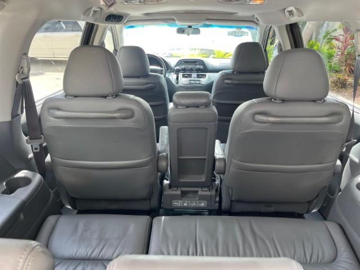 2006 Sage Brush Pearl /Gray Honda Odyssey EX-L LOW MILES 61,166 (5FNRL38696B) with an 3.5L SOHC MPFI 24-Valve i-VTEC V6 Engine engine, Automatic transmission, located at 4701 North Dixie Hwy, Pompano Beach, FL, 33064, (954) 422-2889, 26.240938, -80.123474 - OUR WEBPAGE FLORIDACARS1.COM HAS OVER 100 PHOTOS AND FREE CARFAX LINK 2006 HONDA ODYSSEY EX-L ROAD READY 3.5L V6 VIN: 5FNRL38696B408340 NO RECALLS 28 MPG VAN POWER SLIDING DOORS 3.5L V6 F SOHC 24V 3 ROW LEATHER SEATS GASOLINE LOW MILES 61,166 POWER SUNROOF/MIRRORS FRONT WHEEL DRIVE 1 OWNER 23 SERVIC - Photo#72