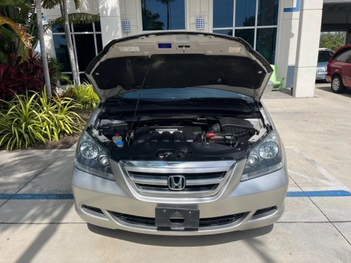 2006 Sage Brush Pearl /Gray Honda Odyssey EX-L LOW MILES 61,166 (5FNRL38696B) with an 3.5L SOHC MPFI 24-Valve i-VTEC V6 Engine engine, Automatic transmission, located at 4701 North Dixie Hwy, Pompano Beach, FL, 33064, (954) 422-2889, 26.240938, -80.123474 - OUR WEBPAGE FLORIDACARS1.COM HAS OVER 100 PHOTOS AND FREE CARFAX LINK 2006 HONDA ODYSSEY EX-L ROAD READY 3.5L V6 VIN: 5FNRL38696B408340 NO RECALLS 28 MPG VAN POWER SLIDING DOORS 3.5L V6 F SOHC 24V 3 ROW LEATHER SEATS GASOLINE LOW MILES 61,166 POWER SUNROOF/MIRRORS FRONT WHEEL DRIVE 1 OWNER 23 SERVIC - Photo#75