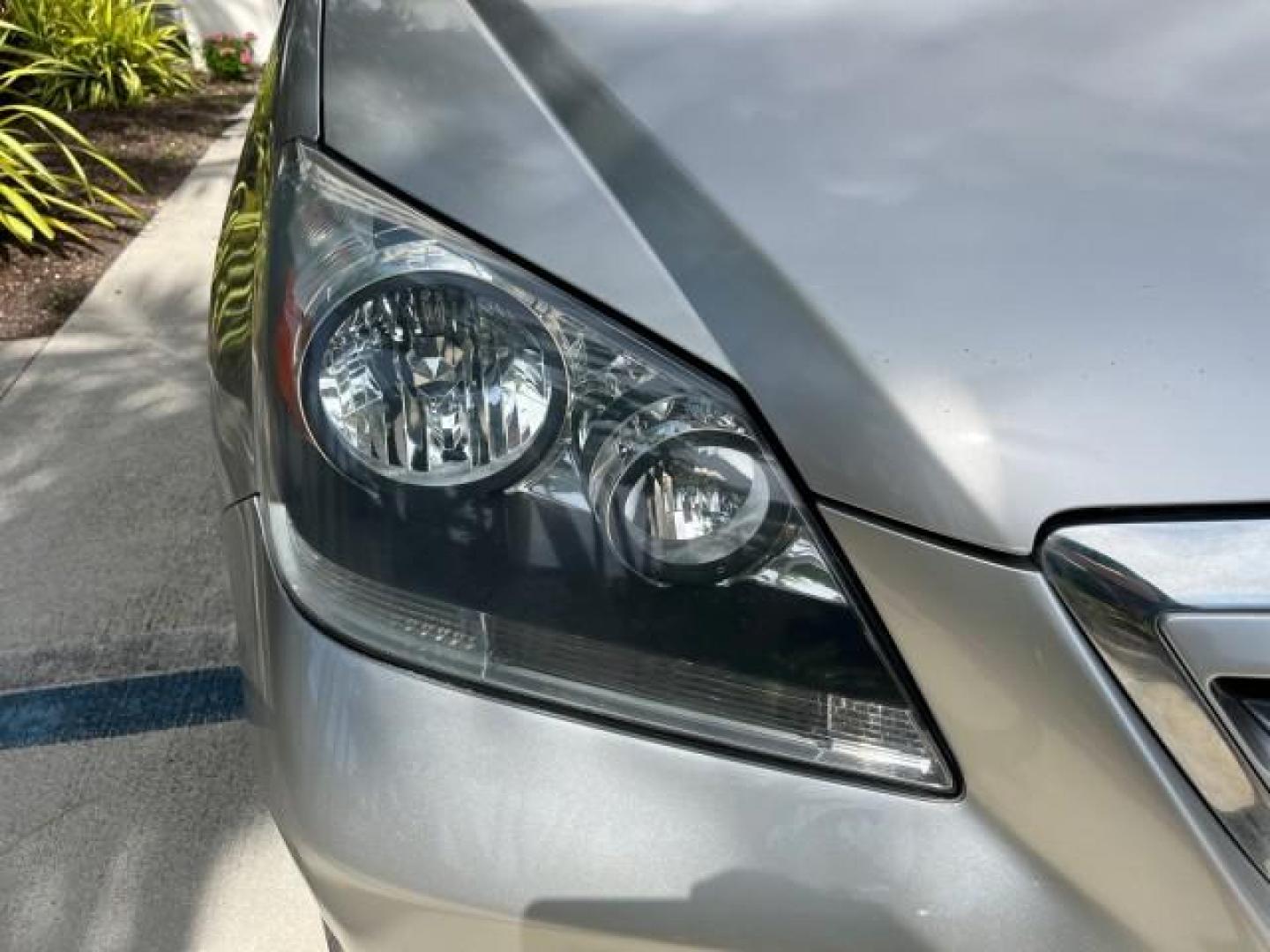 2006 Sage Brush Pearl /Gray Honda Odyssey EX-L LOW MILES 61,166 (5FNRL38696B) with an 3.5L SOHC MPFI 24-Valve i-VTEC V6 Engine engine, Automatic transmission, located at 4701 North Dixie Hwy, Pompano Beach, FL, 33064, (954) 422-2889, 26.240938, -80.123474 - OUR WEBPAGE FLORIDACARS1.COM HAS OVER 100 PHOTOS AND FREE CARFAX LINK 2006 HONDA ODYSSEY EX-L ROAD READY 3.5L V6 VIN: 5FNRL38696B408340 NO RECALLS 28 MPG VAN POWER SLIDING DOORS 3.5L V6 F SOHC 24V 3 ROW LEATHER SEATS GASOLINE LOW MILES 61,166 POWER SUNROOF/MIRRORS FRONT WHEEL DRIVE 1 OWNER 23 SERVIC - Photo#83