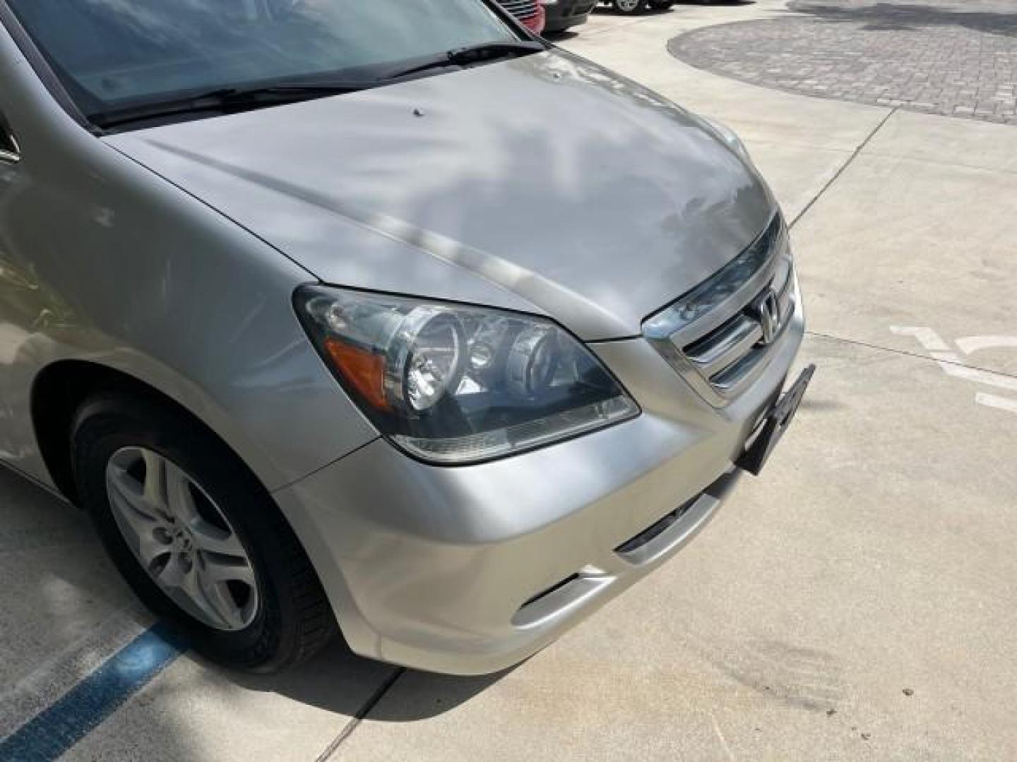 2006 Sage Brush Pearl /Gray Honda Odyssey EX-L LOW MILES 61,166 (5FNRL38696B) with an 3.5L SOHC MPFI 24-Valve i-VTEC V6 Engine engine, Automatic transmission, located at 4701 North Dixie Hwy, Pompano Beach, FL, 33064, (954) 422-2889, 26.240938, -80.123474 - OUR WEBPAGE FLORIDACARS1.COM HAS OVER 100 PHOTOS AND FREE CARFAX LINK 2006 HONDA ODYSSEY EX-L ROAD READY 3.5L V6 VIN: 5FNRL38696B408340 NO RECALLS 28 MPG VAN POWER SLIDING DOORS 3.5L V6 F SOHC 24V 3 ROW LEATHER SEATS GASOLINE LOW MILES 61,166 POWER SUNROOF/MIRRORS FRONT WHEEL DRIVE 1 OWNER 23 SERVIC - Photo#86